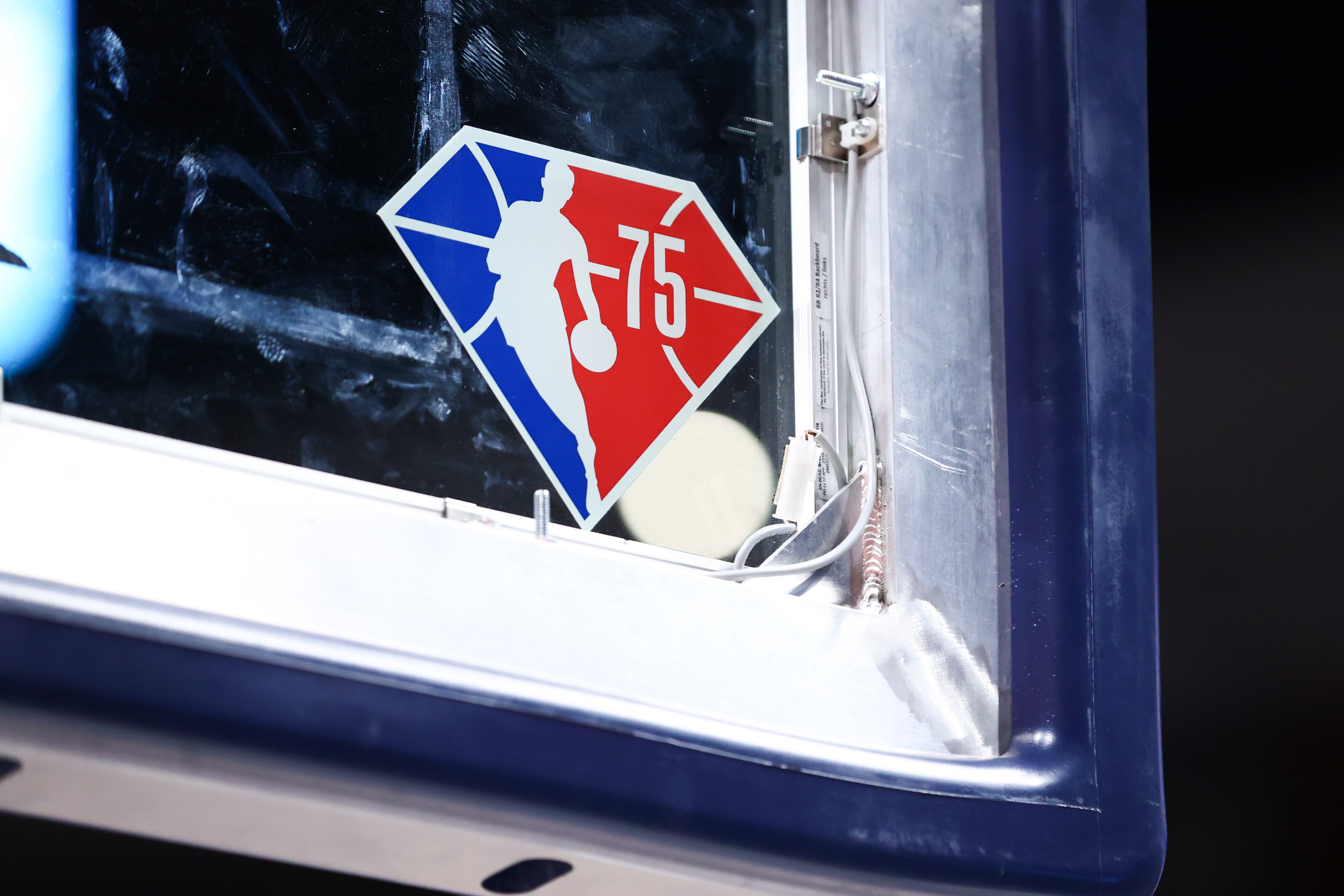 DENVER, CO - DECEMBER 13: A logo honoring the 75th anniversary of the NBA is seen on the backboard before the game between the Denver Nuggets and the Washington Wizards at Ball Arena on December 13, 2021 in Denver, Colorado. NOTE TO USER: User expressly acknowledges and agrees that, by downloading and or using this photograph, User is consenting to the terms and conditions of the Getty Images License Agreement. (Photo by C. Morgan Engel/Getty Images)