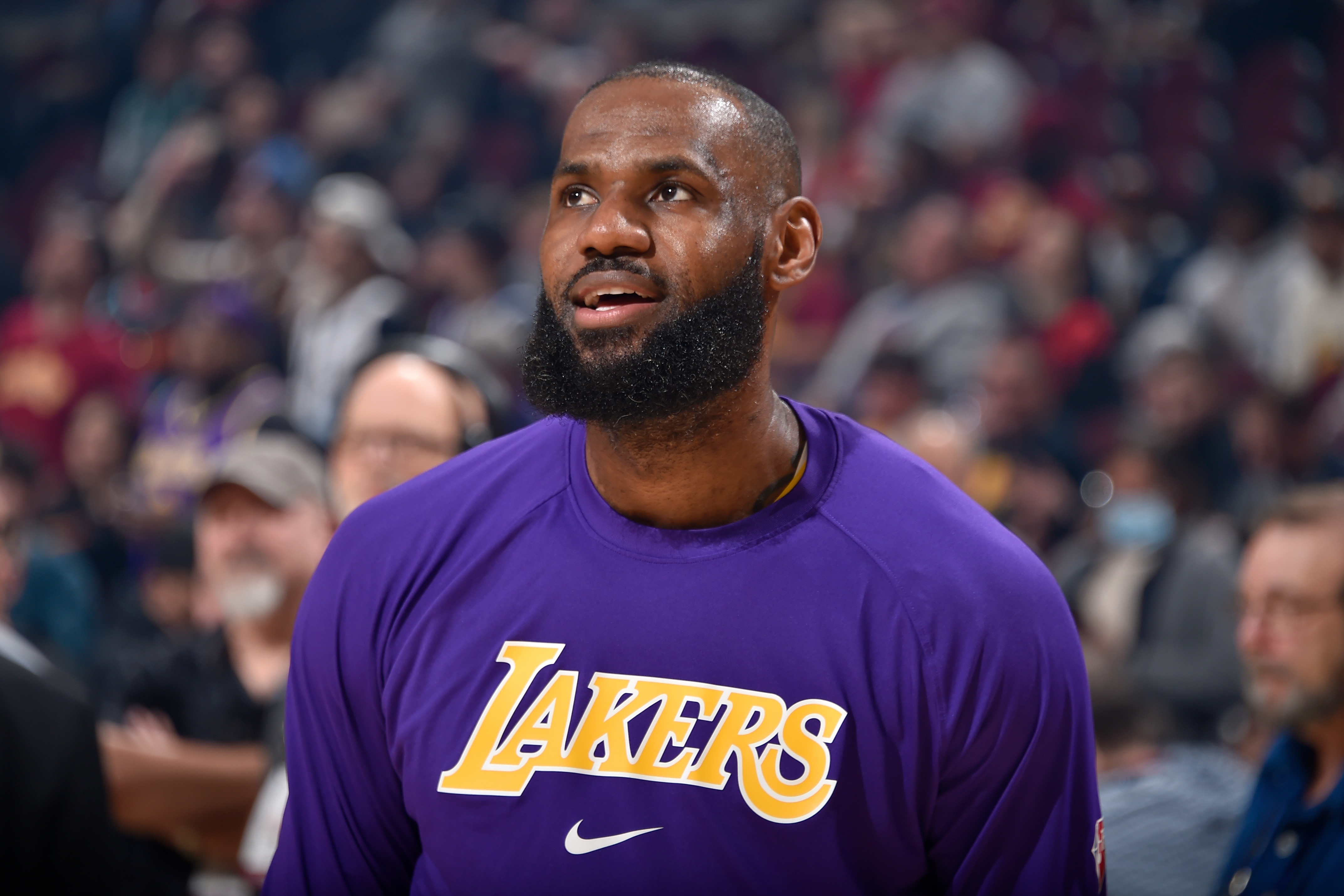CLEVELAND, OH - MARCH 21: LeBron James #6 of the Los Angeles Lakers looks on before the game against the Cleveland Cavaliers on March 21, 2022 at Rocket Mortgage FieldHouse in Cleveland, Ohio. NOTE TO USER: User expressly acknowledges and agrees that, by downloading and/or using this Photograph, user is consenting to the terms and conditions of the Getty Images License Agreement. Mandatory Copyright Notice: Copyright 2022 NBAE (Photo by David Liam Kyle/NBAE via Getty Images)