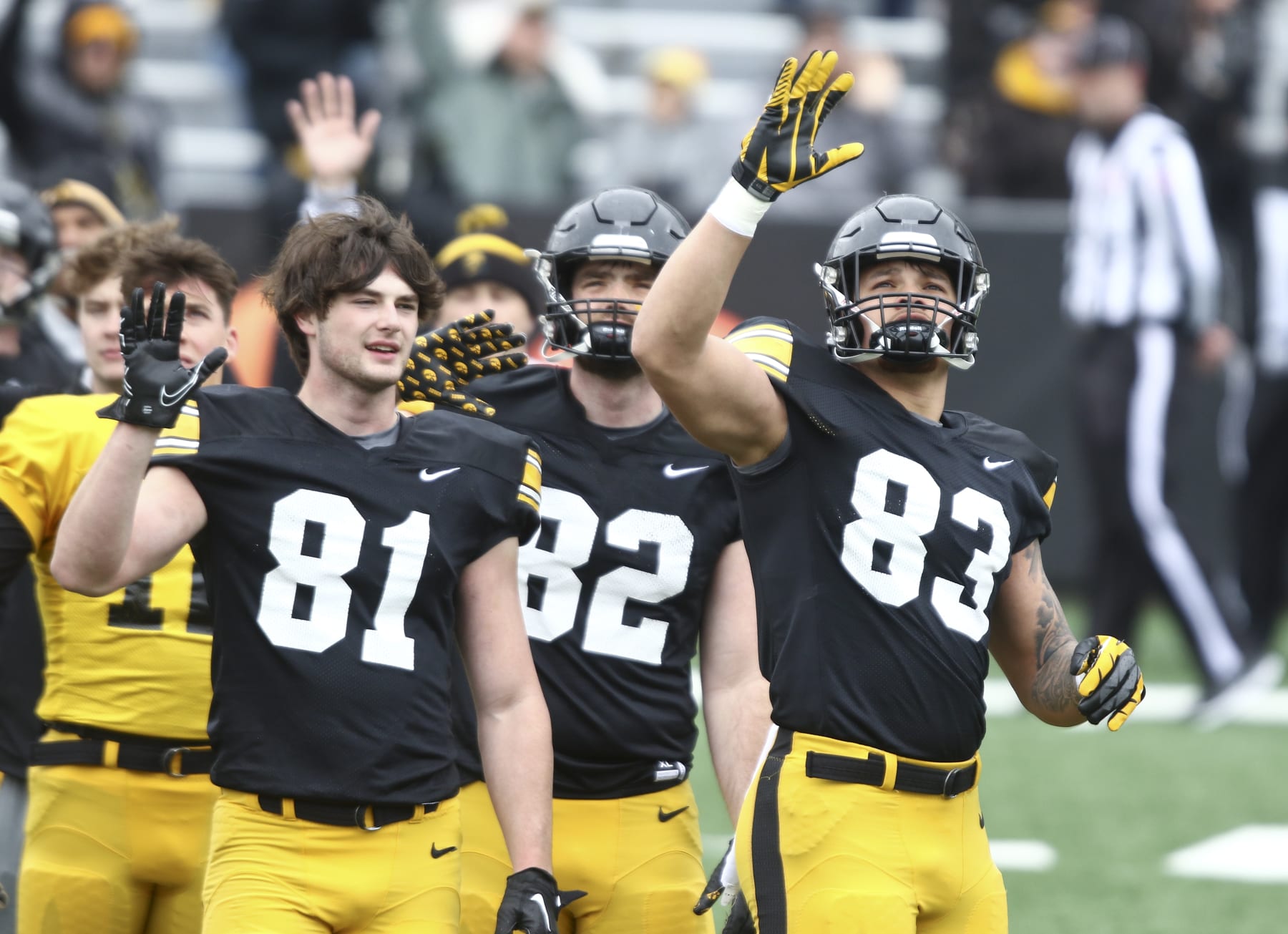 IOWA CITY, IOWA- APRIL 22:  Tight end Erick All #83 of the Iowa Hawkeyes waves to patients at the Iowa Stead Family Children's Hospital during a break in the action during the Iowa Spring Open Practice against defensive lineman       at Kinnick Stadium on April 22, 2023 in Iowa City, Iowa.  (Photo by Matthew Holst/Getty Images)