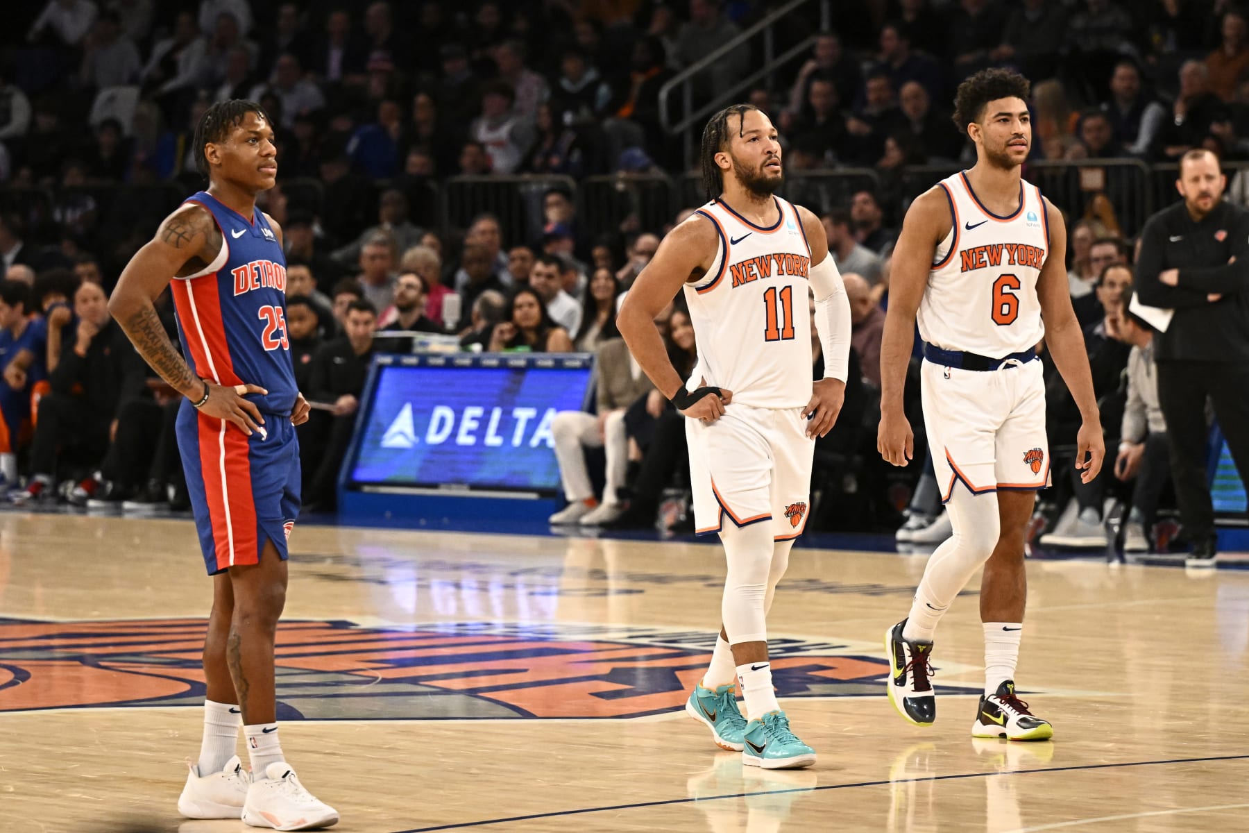 NEW YORK, NY - NOVEMBER 30: Marcus Sasser #25 of the Detroit Pistons looks on with The New York Knicks players Jalen Brunson #11 and Quentin Grimes #6 during the game on November 30, 2023 at Madison Square Garden in New York City, New York.  NOTE TO USER: User expressly acknowledges and agrees that, by downloading and or using this photograph, User is consenting to the terms and conditions of the Getty Images License Agreement. Mandatory Copyright Notice: Copyright 2023 NBAE  (Photo by David Dow/NBAE via Getty Images)