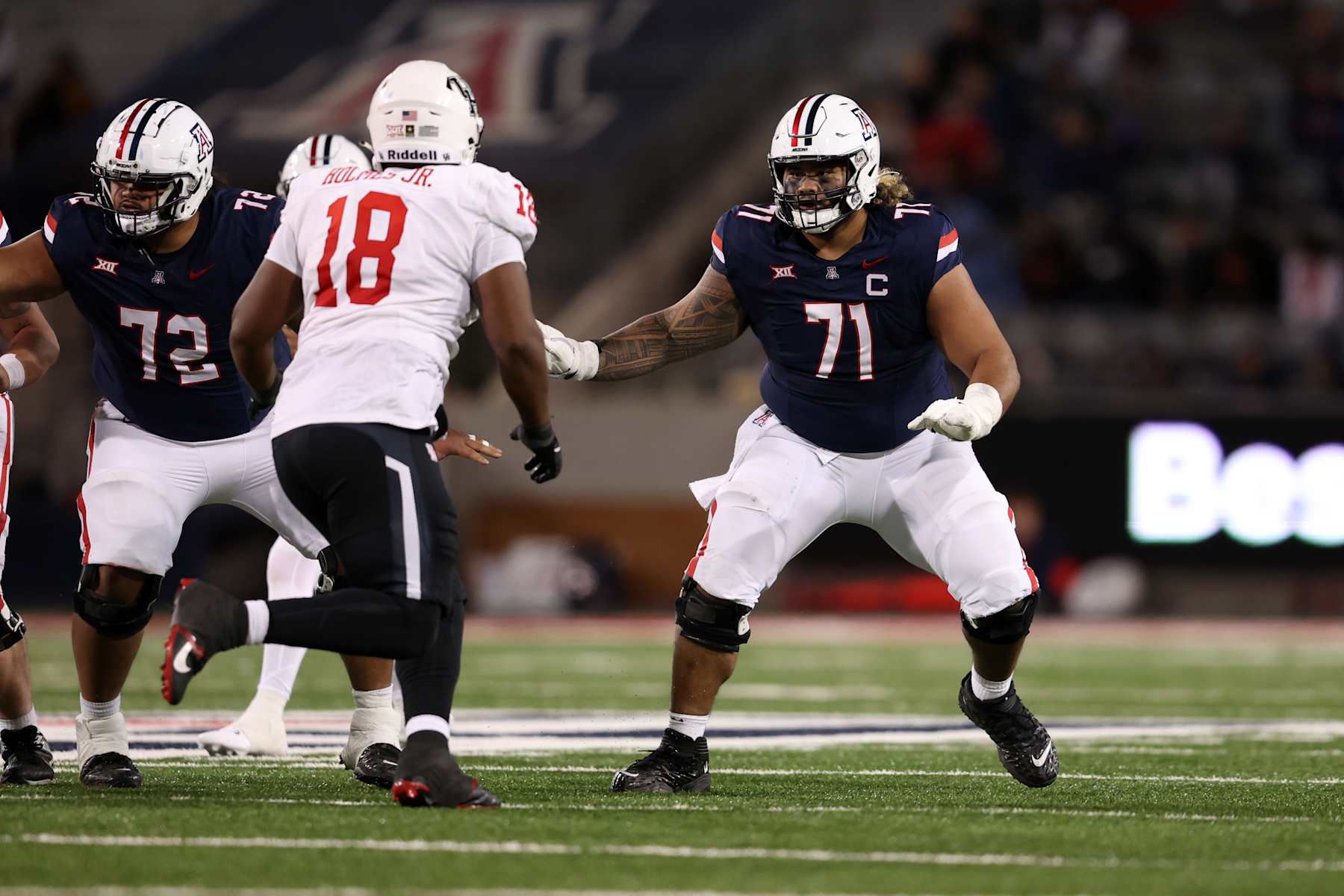Arizona offensive lineman Jonah Savaiinaea