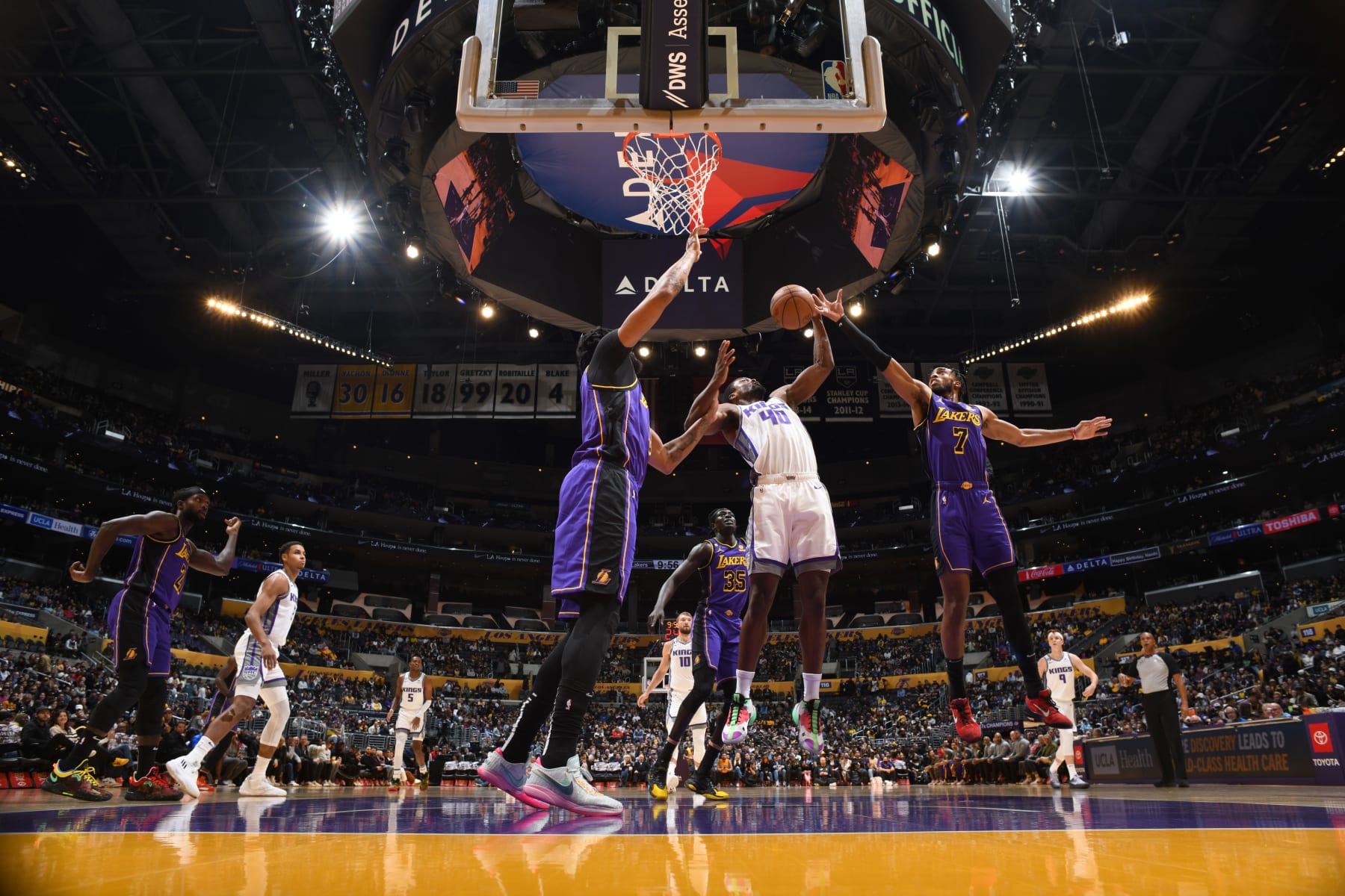 LOS ANGELES, CA - NOVEMBER 11: Harrison Barnes #40 of the Sacramento Kings and Troy Brown #7 of the Los Angeles Lakers moves the ball during the game on November 11, 2022 at Crypto.com Arena in Los Angeles, California. NOTE TO USER: User expressly acknowledges and agrees that, by downloading and/or using this Photograph, user is consenting to the terms and conditions of the Getty Images License Agreement. Mandatory Copyright Notice: Copyright 2022 NBAE (Photo by Adam Pantozzi/NBAE via Getty Images)