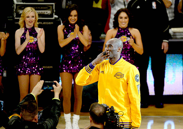 LOS ANGELES, CA - APRIL 13:  Kobe Bryant #24 of the Los Angeles Lakers waves to the crowd as he walks on the court before the game against the Utah Jazz on April 13, 2016 at Staples Center in Los Angeles, California.  (Photo by Kevork Djansezian/Getty Images)