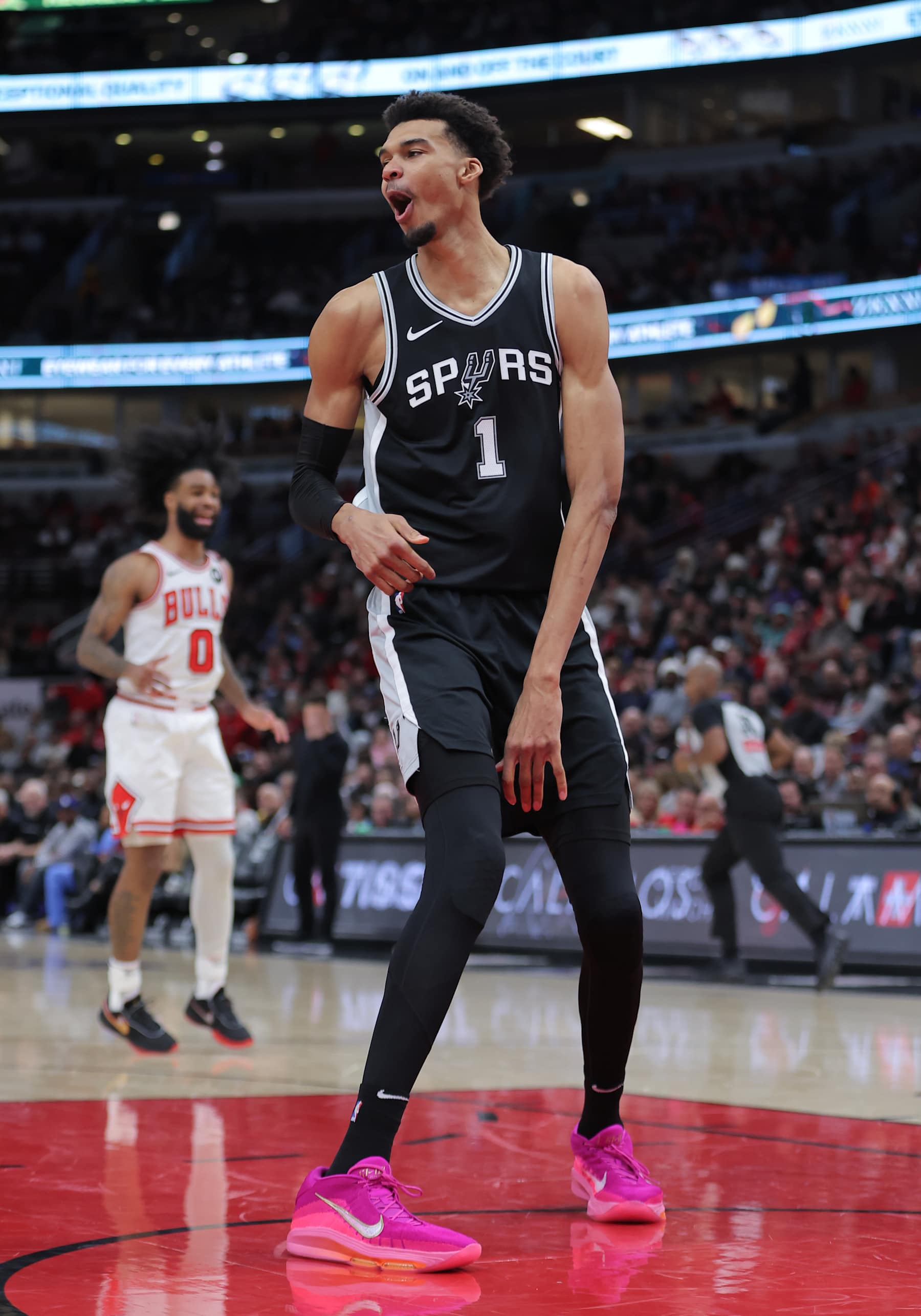 CHICAGO, IL - JANUARY 06: Victor Wembanyama #1 of the San Antonio Spurs reacts after a slam dunk during the first half against the Chicago Bulls on January 6, 2025 at the United Center in Chicago, Illinois. (Photo by Melissa Tamez/Icon Sportswire via Getty Images)