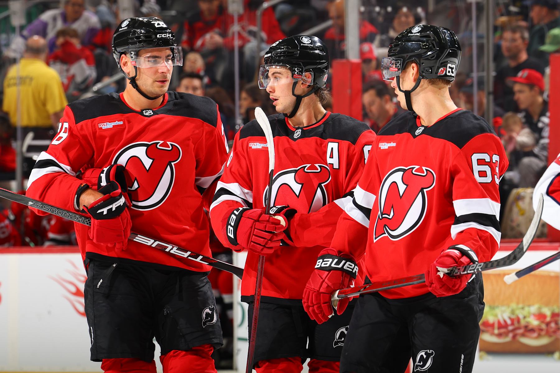 Timo Meier, Jack Hughes and Jesper Bratt.