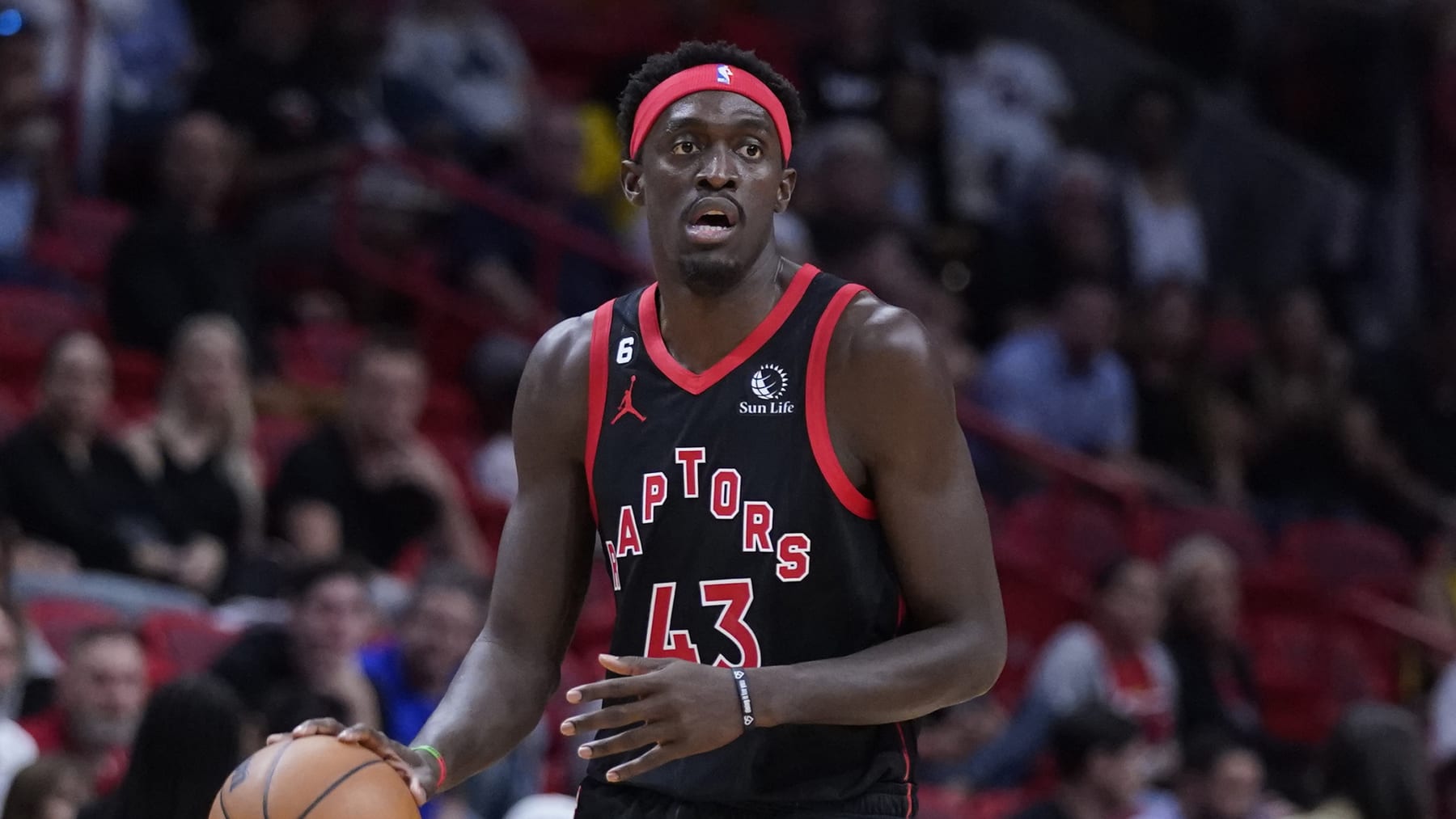 Toronto Raptors forward Pascal Siakam looks for an open teammate during the first half of an NBA basketball game against the Miami Heat, Monday, Oct. 24, 2022, in Miami. (AP Photo/Wilfredo Lee)