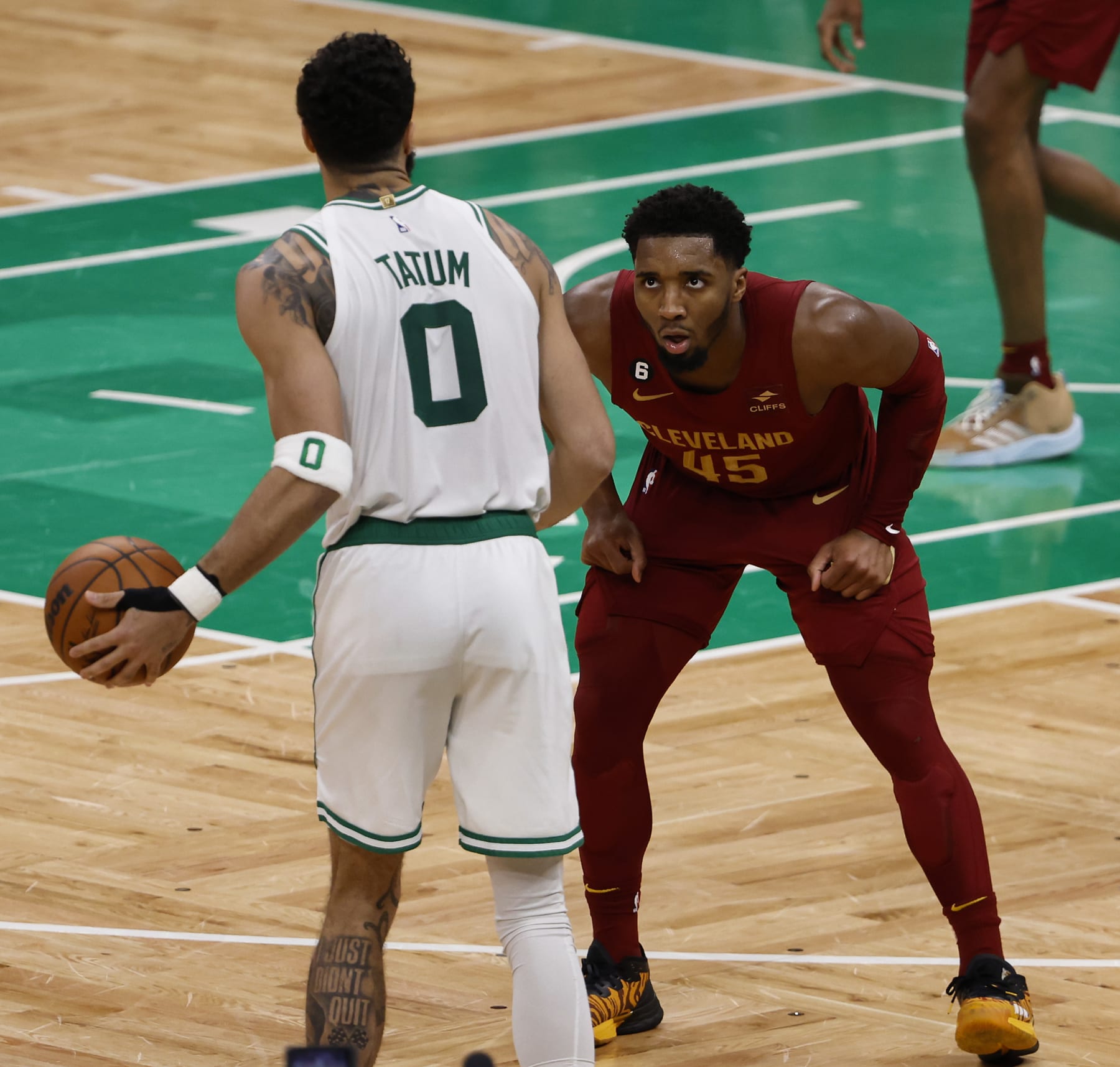 BOSTON, MA - MARCH 1: Donovan Mitchell #45 of the Cleveland Cavaliers defends against Jayson Tatum #0 of the Boston Celtics during the fourth quarter at TD Garden on March 1, 2023 in Boston, Massachusetts. NOTE TO USER: User expressly acknowledges and agrees that, by downloading and/or using this Photograph, user is consenting to the terms and conditions of the Getty Images License Agreement. (Photo By Winslow Townson/Getty Images)