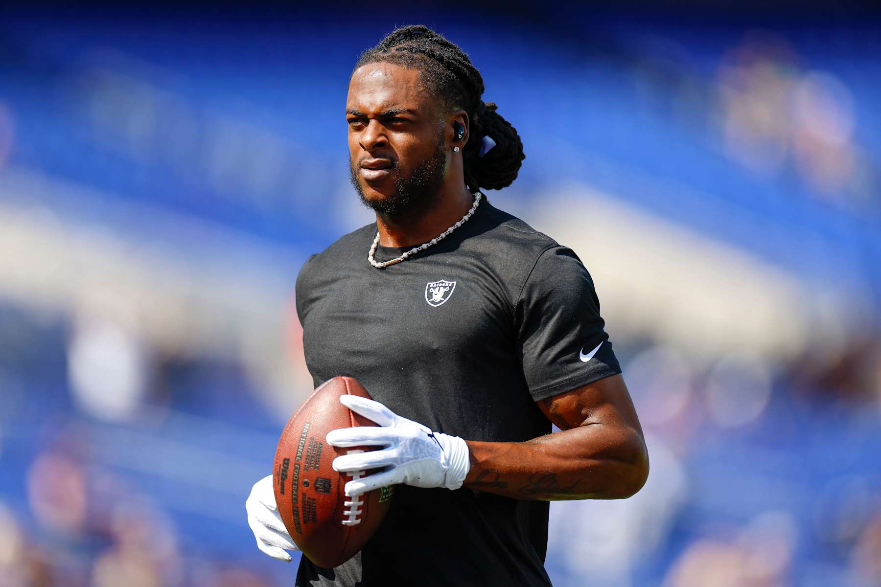 BALTIMORE, MARYLAND - SEPTEMBER 15: Davante Adams #17 of the Las Vegas Raiders warms up on the field prior to game against the Baltimore Ravens at M&T Bank Stadium on September 15, 2024 in Baltimore, Maryland. (Photo by Brandon Sloter/Getty Images)