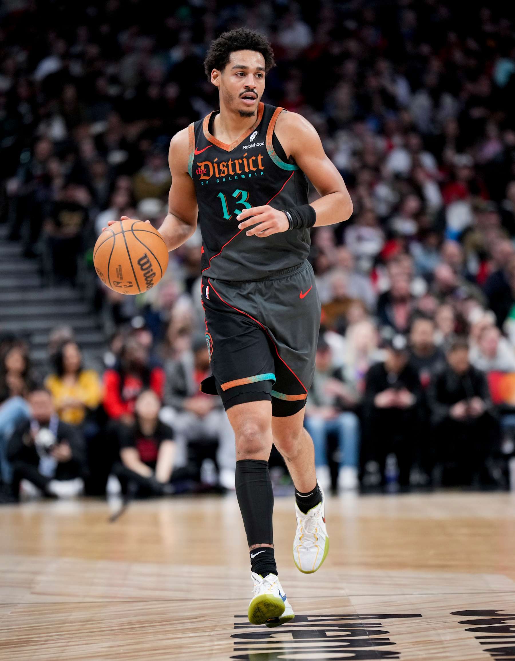 TORONTO, ON - APRIL 7: Jordan Poole #13 of the Washington Wizards dribbles against the Toronto Raptors during the first half of their basketball game at the Scotiabank Arena on April 7, 2024 in Toronto, Ontario, Canada. NOTE TO USER: User expressly acknowledges and agrees that, by downloading and/or using this Photograph, user is consenting to the terms and conditions of the Getty Images License Agreement. (Photo by Mark Blinch/Getty Images)
