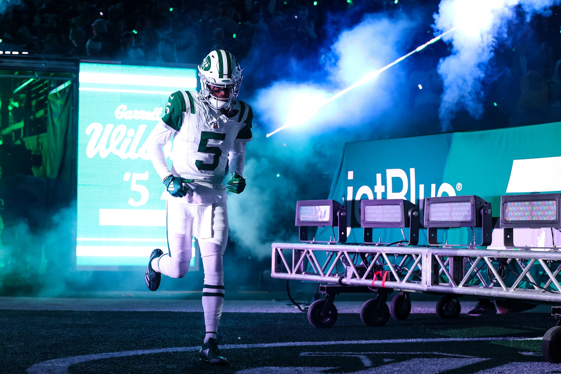 EAST RUTHERFORD, NJ - OCTOBER 14: Garrett Wilson #5 of the New York Jets runs out of the tunnel prior to an NFL football game against the Buffalo Bills at MetLife Stadium on October 14, 2024 in East Rutherford, NJ. (Photo by Perry Knotts/Getty Images)