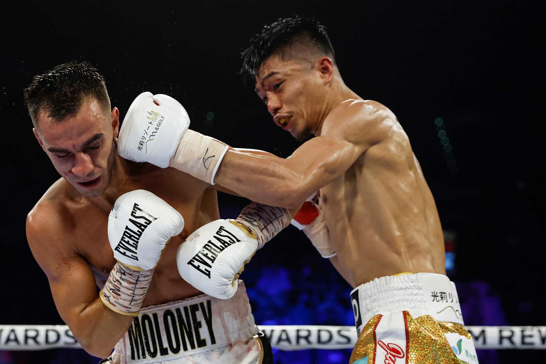 LAS VEGAS, NEVADA - MAY 20: Andrew Moloney of Australia is punched by Junto Nakatani of Japan during their junior bantamweight bout at MGM Grand Garden Arena on May 20, 2023 in Las Vegas, Nevada. (Photo by Sarah Stier/Getty Images)
