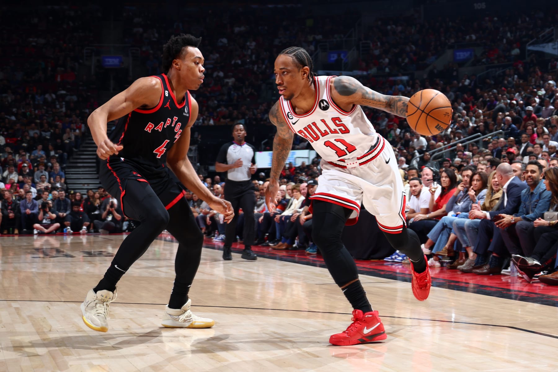 TORONTO, CANADA - APRIL 12: DeMar DeRozan #11 of the Chicago Bulls dribbles the ball during the game against the Toronto Raptors during the 2023 Play-In Tournament on April 12, 2023 at the Scotiabank Arena in Toronto, Ontario, Canada.  NOTE TO USER: User expressly acknowledges and agrees that, by downloading and or using this Photograph, user is consenting to the terms and conditions of the Getty Images License Agreement.  Mandatory Copyright Notice: Copyright 2023 NBAE (Photo by Vaughn Ridley/NBAE via Getty Images)