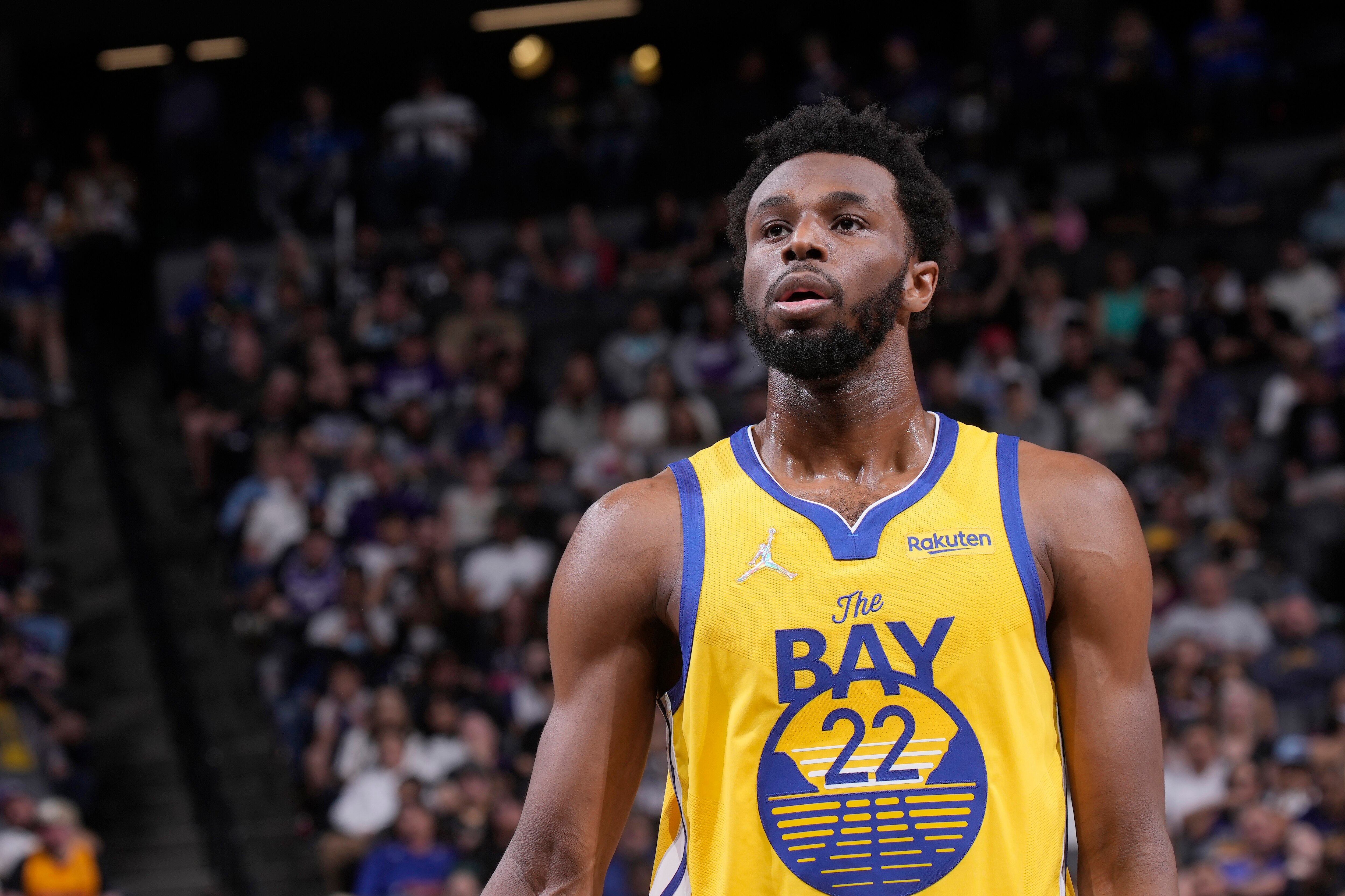 SACRAMENTO, CA - APRIL 3: Andrew Wiggins #22 of the Golden State Warriors looks on during the game against the Sacramento Kings on April 3, 2022 at Golden 1 Center in Sacramento, California. NOTE TO USER: User expressly acknowledges and agrees that, by downloading and or using this photograph, User is consenting to the terms and conditions of the Getty Images Agreement. Mandatory Copyright Notice: Copyright 2022 NBAE (Photo by Rocky Widner/NBAE via Getty Images)