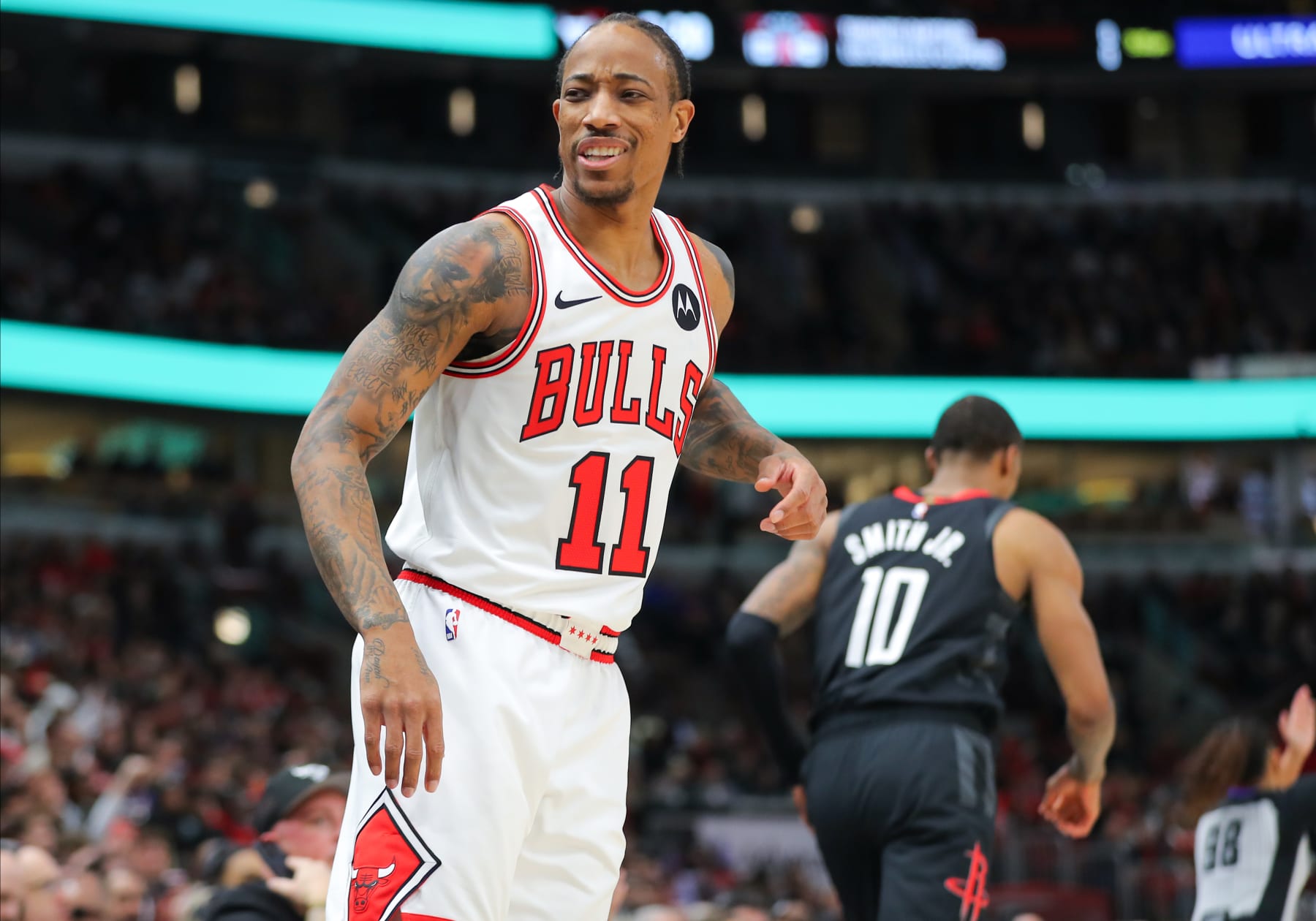 CHICAGO, IL - JANUARY 10: DeMar DeRozan #11 of the Chicago Bulls reacts after a 3-point basket during the first half against the Houston Rockets at the United Center on January 10, 2024 in Chicago, Illinois. (Photo by Melissa Tamez/Icon Sportswire via Getty Images)