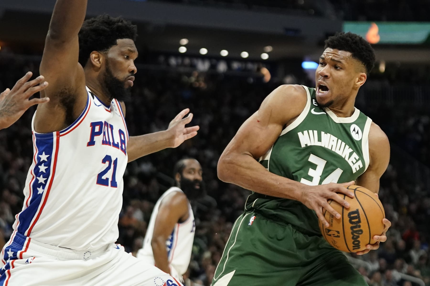 Milwaukee Bucks' Giannis Antetokounmpo drives to the basket against Philadelphia 76ers' Joel Embiid during the second half of an NBA basketball game Saturday, March 4, 2023, in Milwaukee. (AP Photo/Aaron Gash)