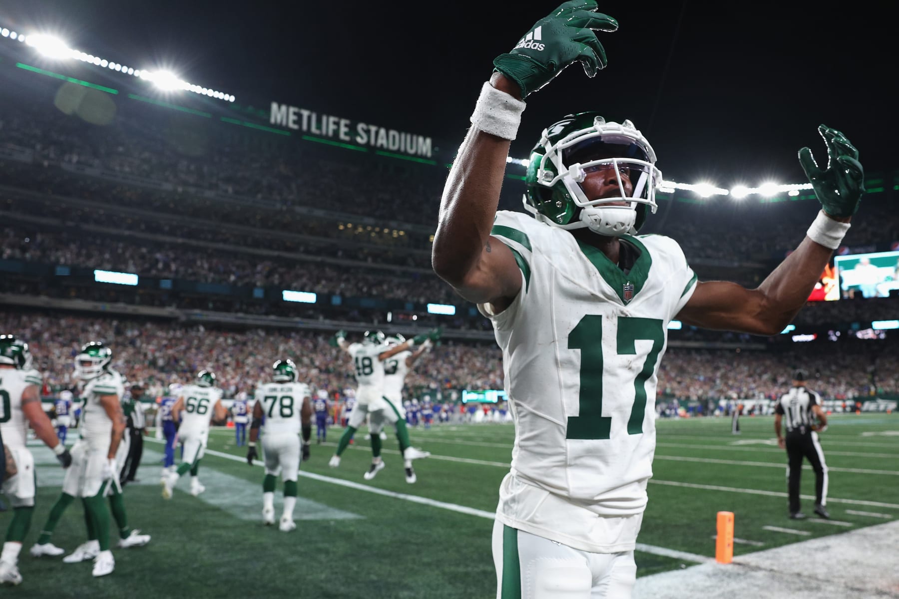 EAST RUTHERFORD, NEW JERSEY - SEPTEMBER 11: Wide receiver Garrett Wilson #17 of the New York Jets reacts during the fourth quarter of the NFL game against the Buffalo Bills at MetLife Stadium on September 11, 2023 in East Rutherford, New Jersey. (Photo by Elsa/Getty Images)