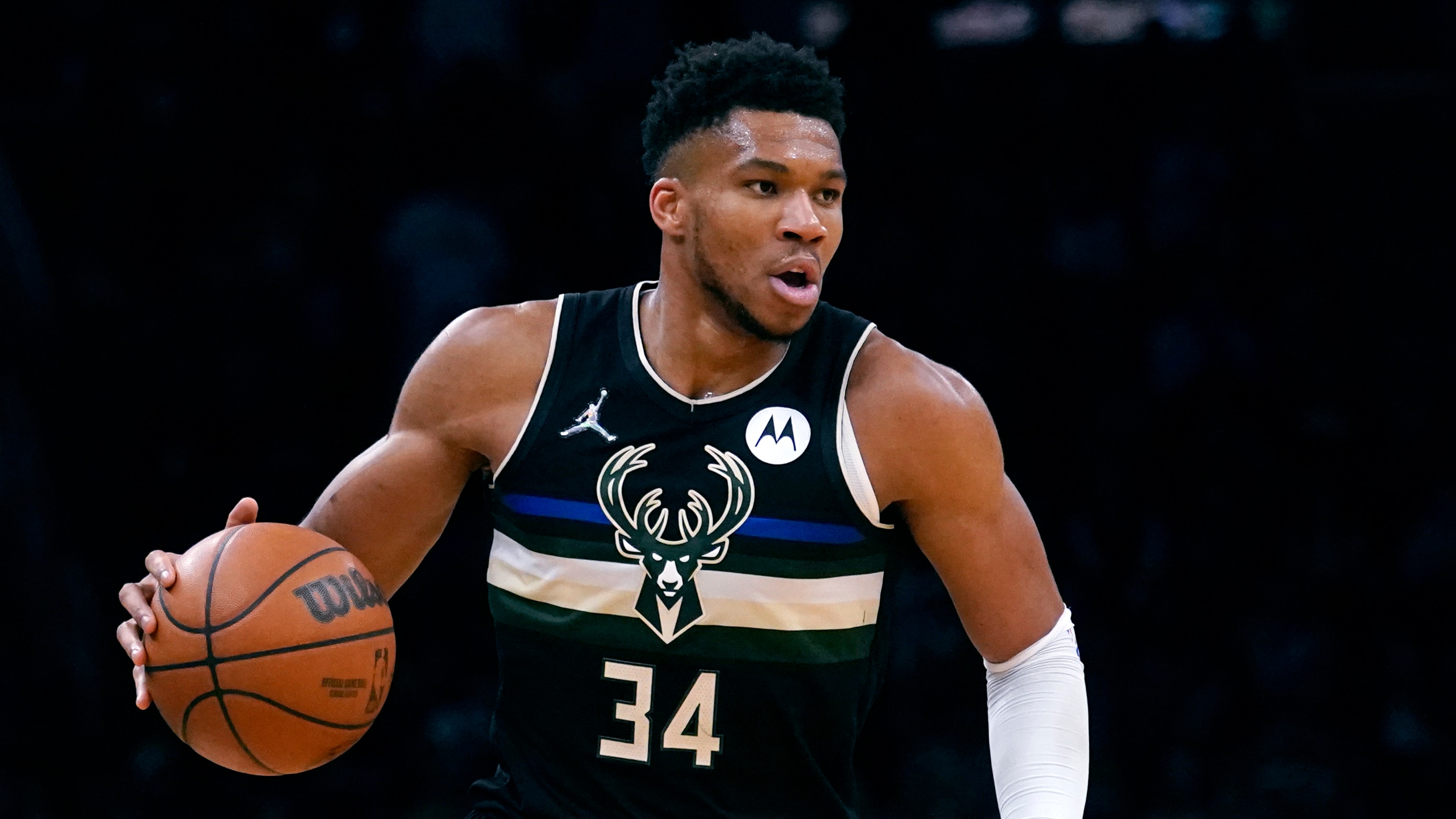 Milwaukee Bucks forward Giannis Antetokounmpo brings the ball up against the Boston Celtics in the first half of Game 2 of an Eastern Conference semifinal in the NBA basketball playoffs Tuesday, May 3, 2022, in Boston. (AP Photo/Charles Krupa)