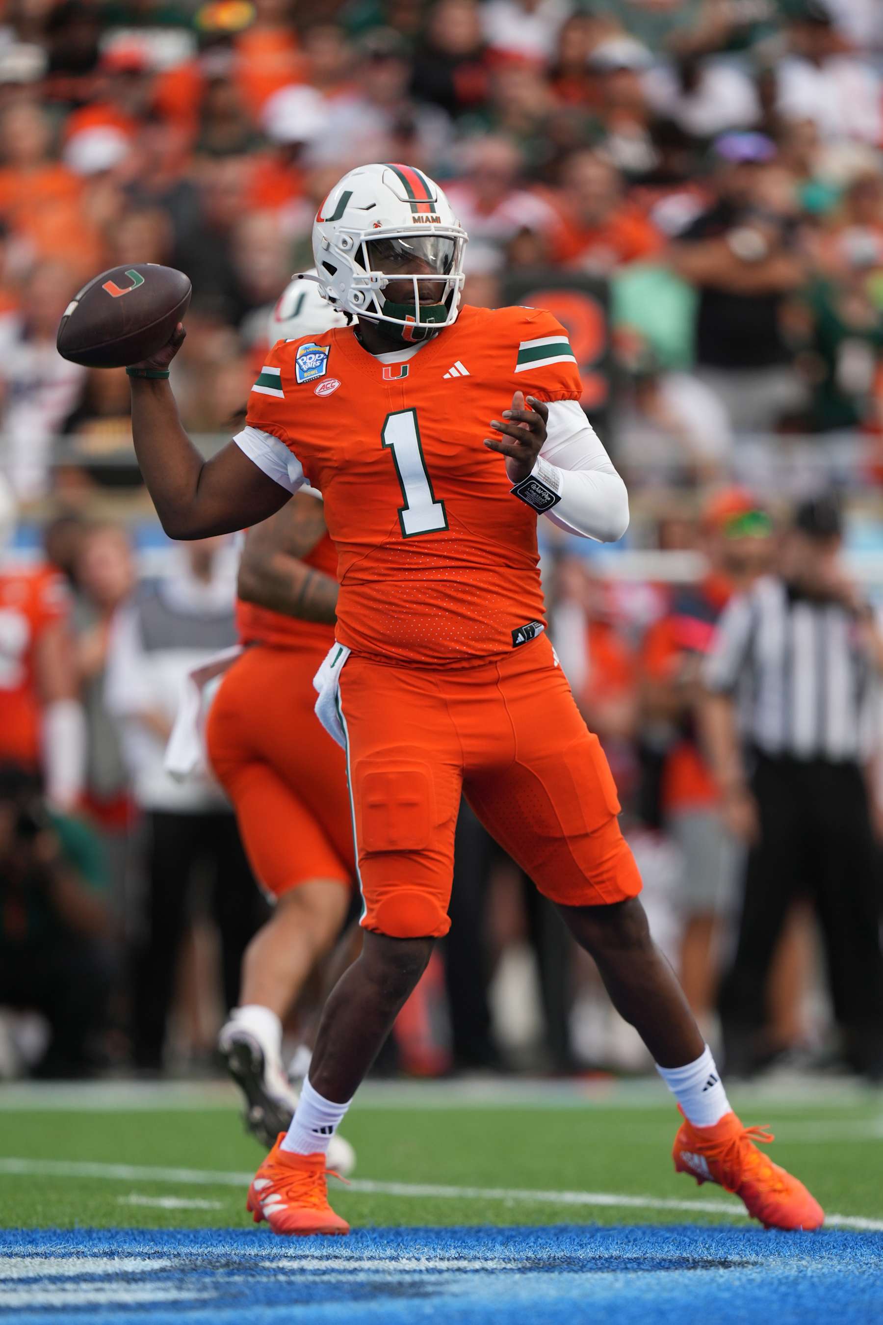 ORLANDO, FL - DECEMBER 28: Miami Hurricanes quarterback Cam Ward (1) makes a pass attempt during the Pop-Tarts Bowl game between the Iowa State Cyclones and the Miami Hurricanes on Saturday, December 28, 2024 at Camping World Stadium in Orlando, Fla. (Photo by Peter Joneleit/Icon Sportswire via Getty Images)