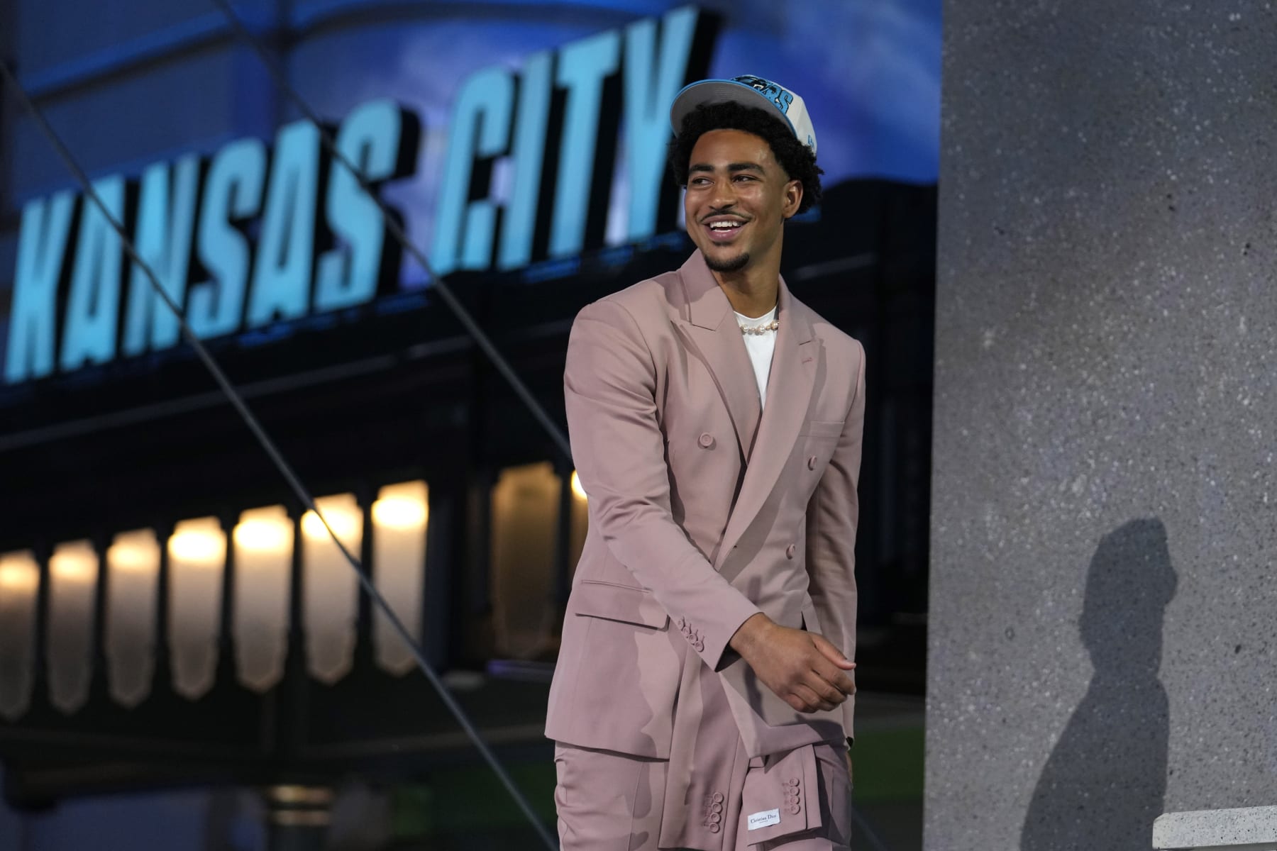 Alabama quarterback Bryce Young reacts after being chosen by Carolina Panthers with the first overall pick during the first round of the NFL football draft, Thursday, April 27, 2023, in Kansas City, Mo. (AP Photo/Jeff Roberson)