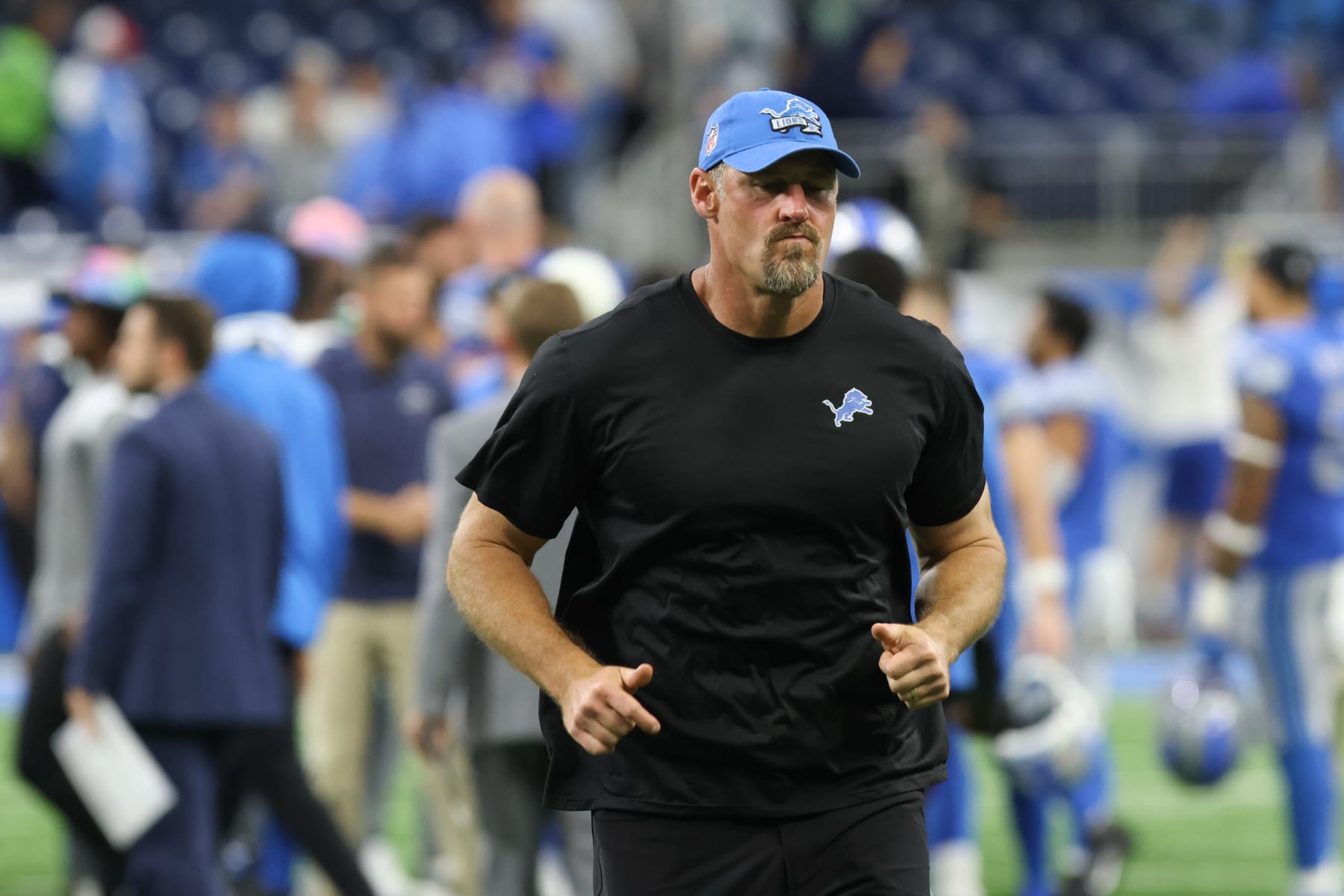DETROIT, MI - OCTOBER 02:  Detroit Lions head coach Dan Campbell runs off of the field at the end of an NFL football game between the Seattle Seahawks and the Detroit Lions on October 2, 2022 at Ford Field in Detroit, Michigan. (Photo by Scott W. Grau/Icon Sportswire via Getty Images)