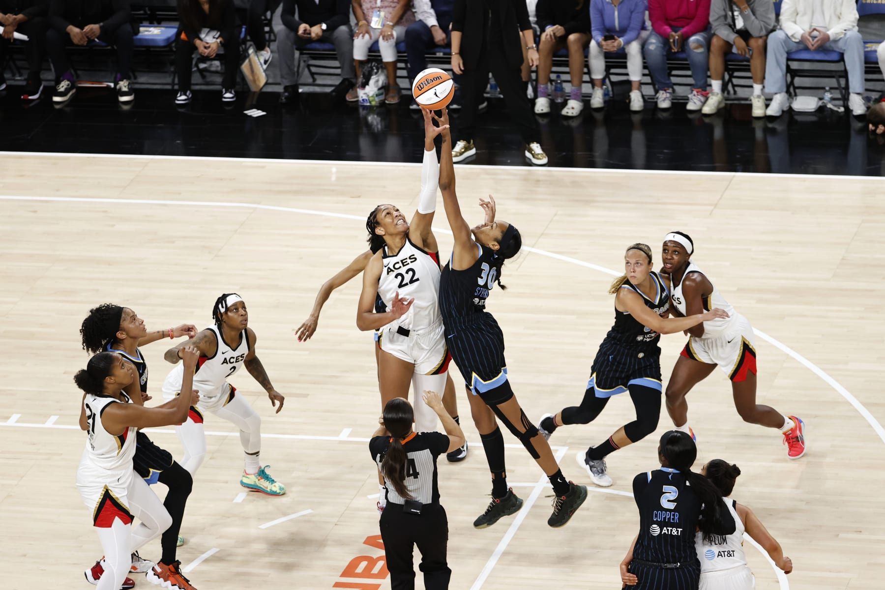 CHICAGO, IL - JULY 26: A'ja Wilson #22 of the Las Vegas Aces and Azurá Stevens #30 of the Chicago Sky reach for the tip-off during the 2022 WNBA Commissioner's Cup game on July 26, 2022 at the Wintrust Arena in Chicago, Illinois. NOTE TO USER: User expressly acknowledges and agrees that, by downloading and or using this photograph, user is consenting to the terms and conditions of the Getty Images License Agreement.  Mandatory Copyright Notice: Copyright 2022 NBAE (Photo by Kamil Krzaczynski/NBAE via Getty Images)