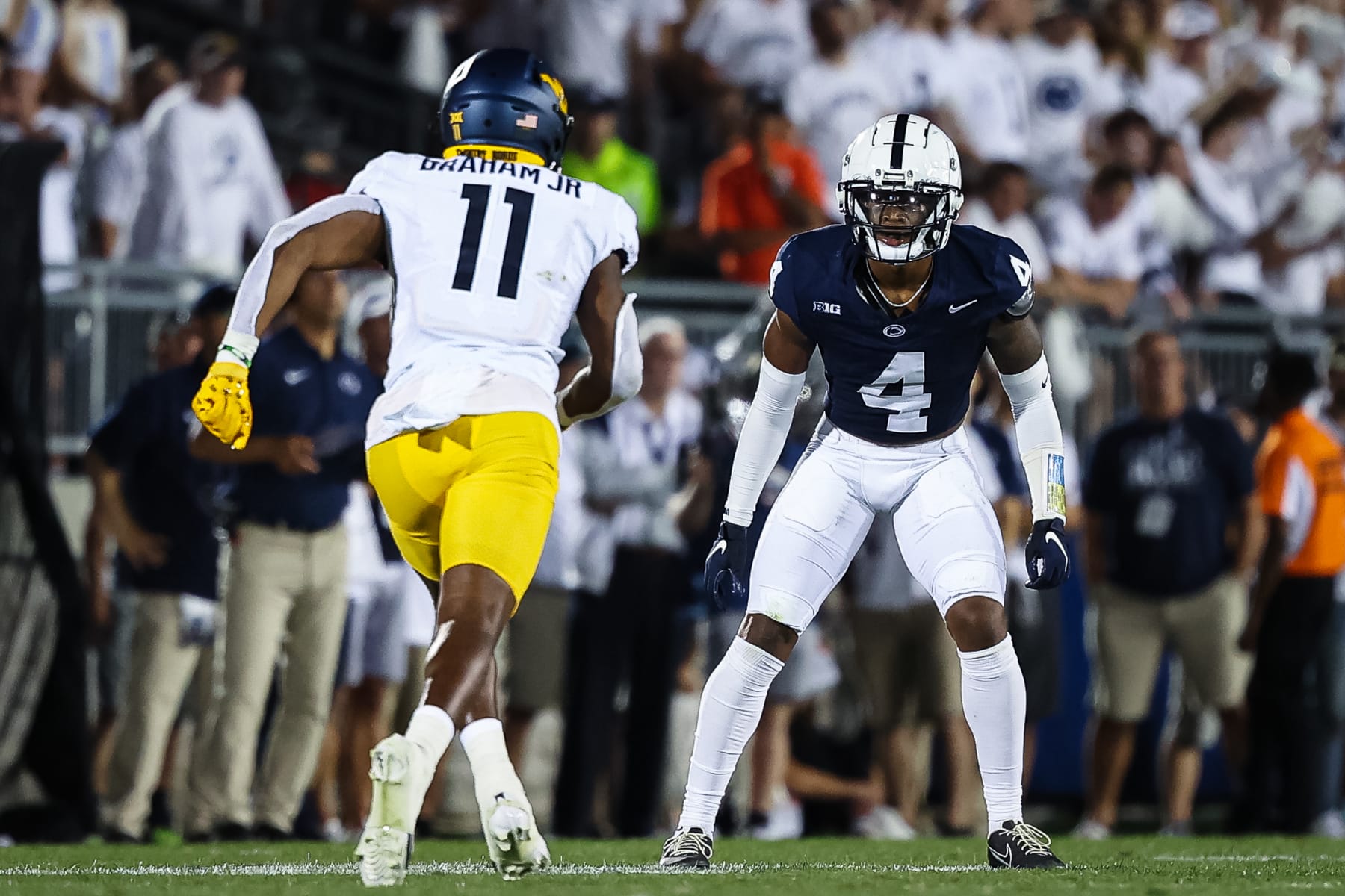STATE COLLEGE, PA - SEPTEMBER 02: Kalen King (R) #4 of the Penn State Nittany Lions defends Cortez Braham Jr. #11 of the West Virginia Mountaineers during the second half of the game at Beaver Stadium on September 2, 2023 in State College, Pennsylvania. (Photo by Scott Taetsch/Getty Images)