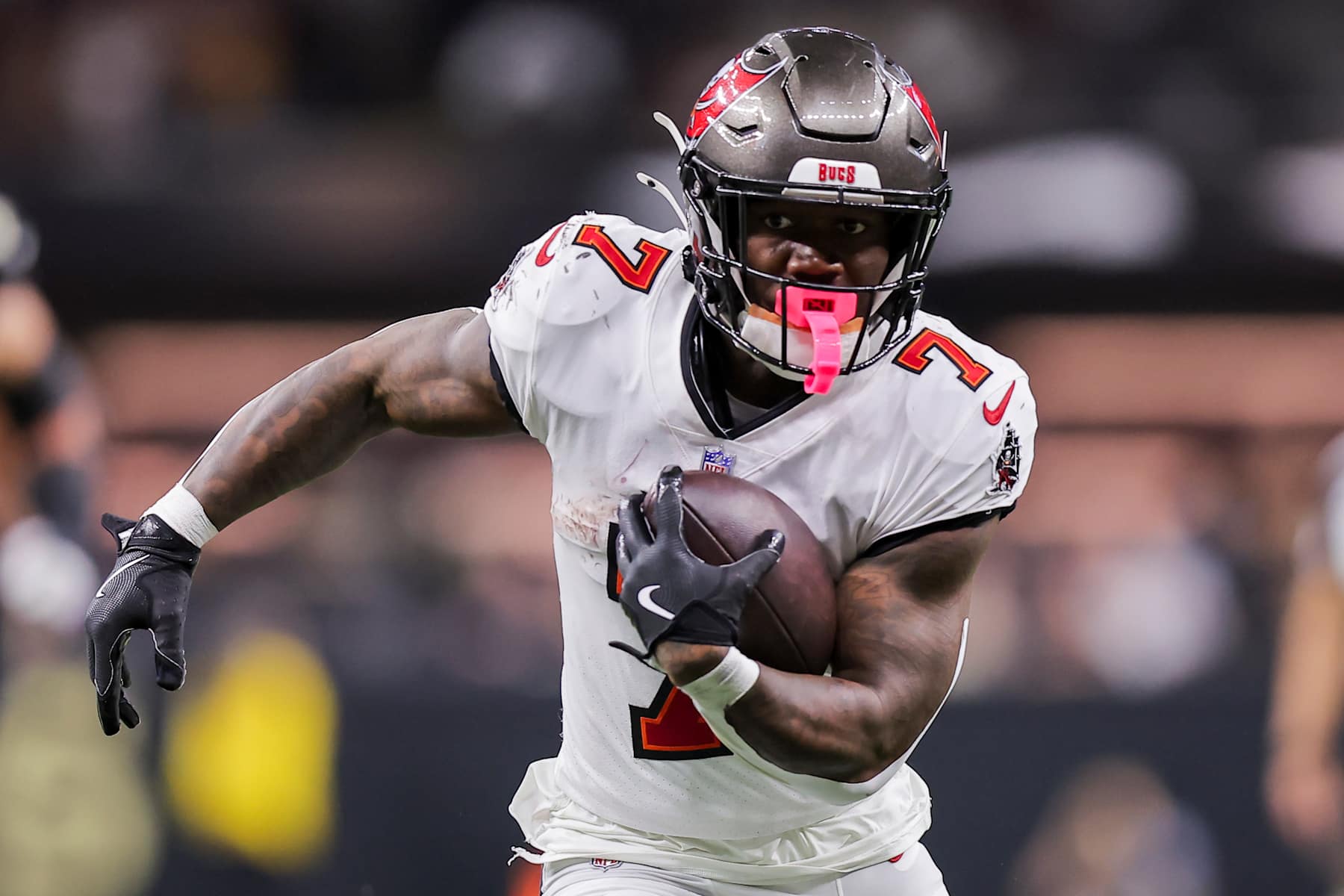 NEW ORLEANS, LOUISIANA - OCTOBER 13: Bucky Irving #7 of the Tampa Bay Buccaneers carries the ball against the New Orleans Saints during the fourth quarter at Caesars Superdome on October 13, 2024 in New Orleans, Louisiana. (Photo by Jonathan Bachman/Getty Images)