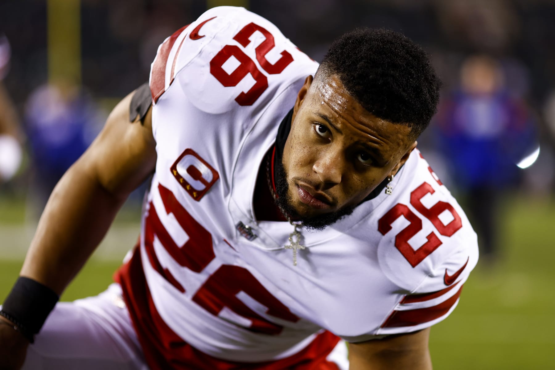 PHILADELPHIA, PA - JANUARY 21: Saquon Barkley #26 of the New York Giants stretches prior to an NFL divisional round football game against the Philadelphia Eagles at Lincoln Financial Field on January 21, 2023 in Philadelphia, Pennsylvania. (Photo by Kevin Sabitus/Getty Images)