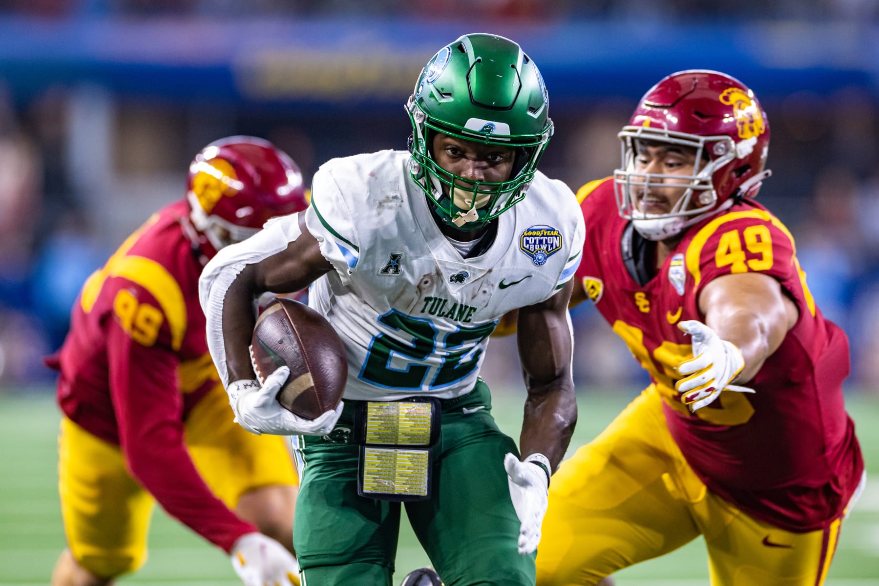ARLINGTON, TX - JANUARY 02: Tulane Green Wave running back Tyjae Spears (#22) runs up field during the Goodyear Cotton Bowl game between the USC Trojans and Tulane Green Wave on January 02, 2023 at AT&T Stadium in Arlington, TX.  (Photo by Matthew Visinsky/Icon Sportswire via Getty Images)