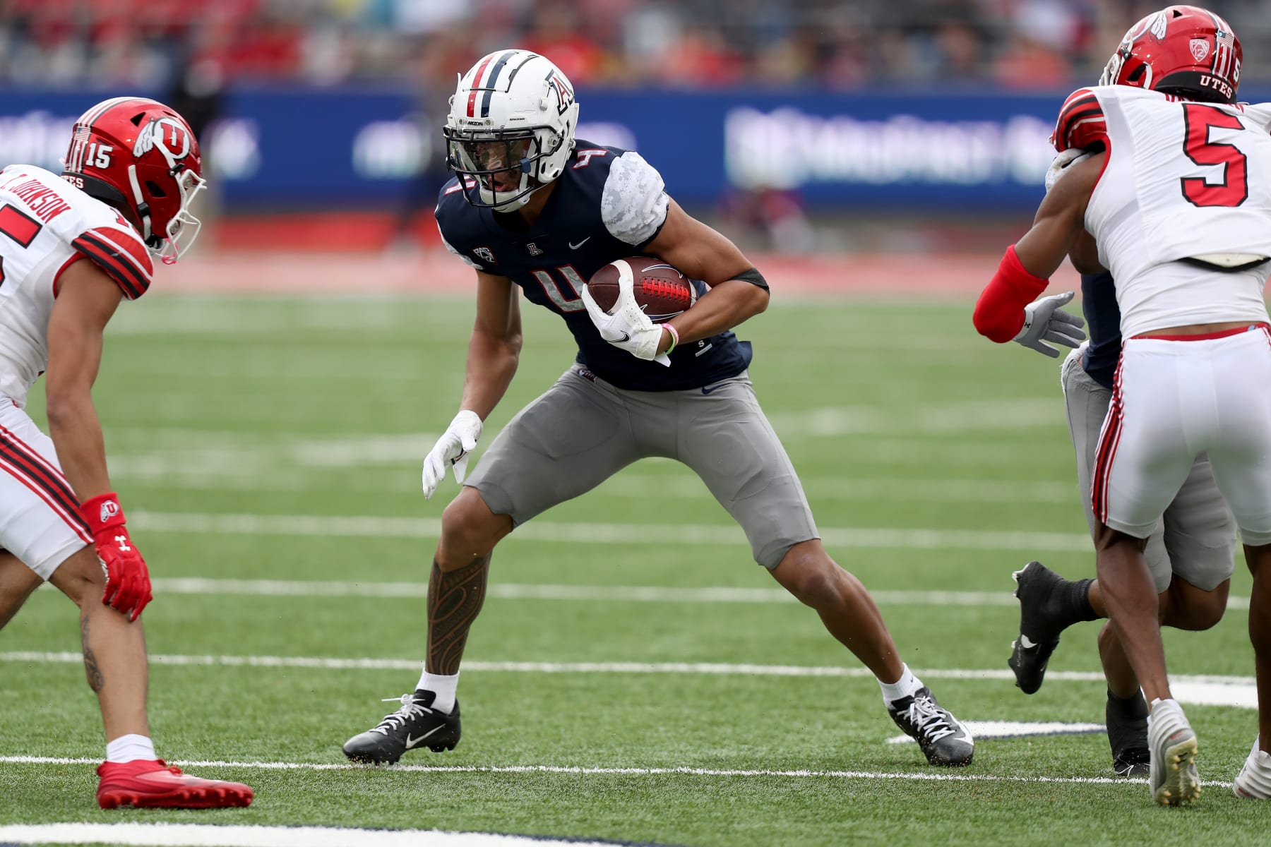 TUCSON, AZ - NOVEMBER 18: Arizona Wildcats wide receiver Tetairoa McMillan #4 during the second half of a football game between the Utah Utes and the University of Arizona Wildcats on November 18, 2023 at Arizona Stadium in Tucson, AZ. (Photo by Christopher Hook/Icon Sportswire via Getty Images)