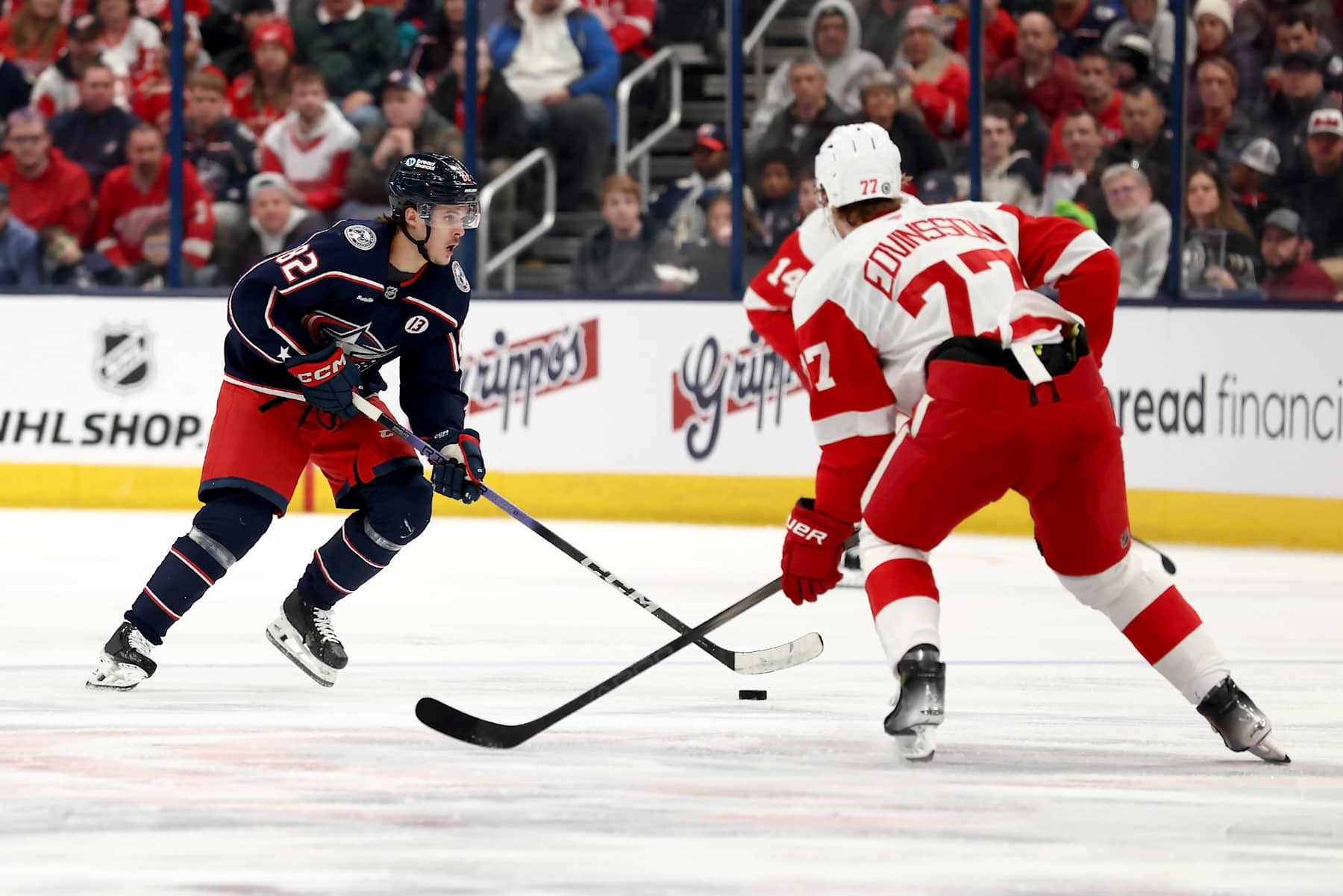 COLUMBUS, OHIO - JANUARY 2:  Mikael Pyyhtia #82 of the Columbus Blue Jackets controls the puck during the game against the Detroit Red Wings at Nationwide Arena on January 2, 2025 in Columbus, Ohio. Detroit defeated Columbus 5-4. (Photo by Kirk Irwin/NHLI via Getty Images)