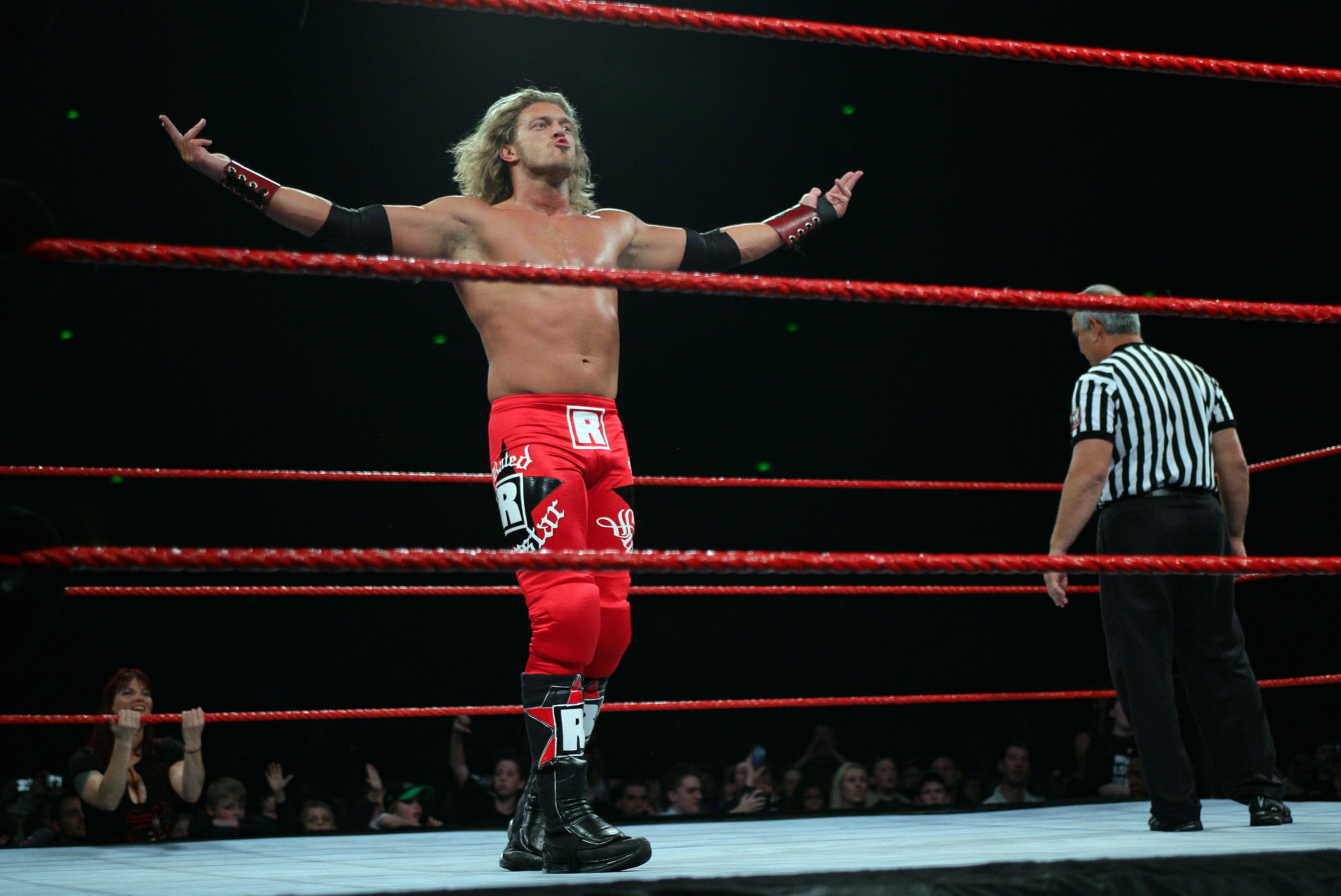 Edge Lita shows he is not shy of making a self-conglagatory gesture during the WWE RAW Superslam event at Acer Arena, Homebush Stadium in Sydney on August 4, 2006. (Photo by Don Arnold/WireImage)