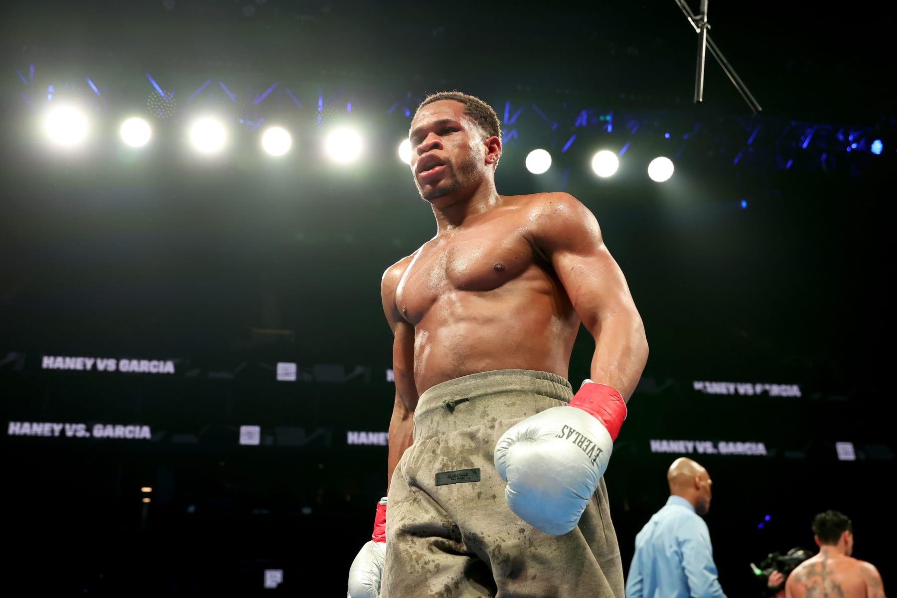 NEW YORK, NEW YORK - APRIL 20: Devin Haney (gray trunks) walks back to his corner during their WBC Super Lightweight title bout against Ryan Garcia at Barclays Center on April 20, 2024 in New York City.  (Photo by Al Bello/Getty Images)