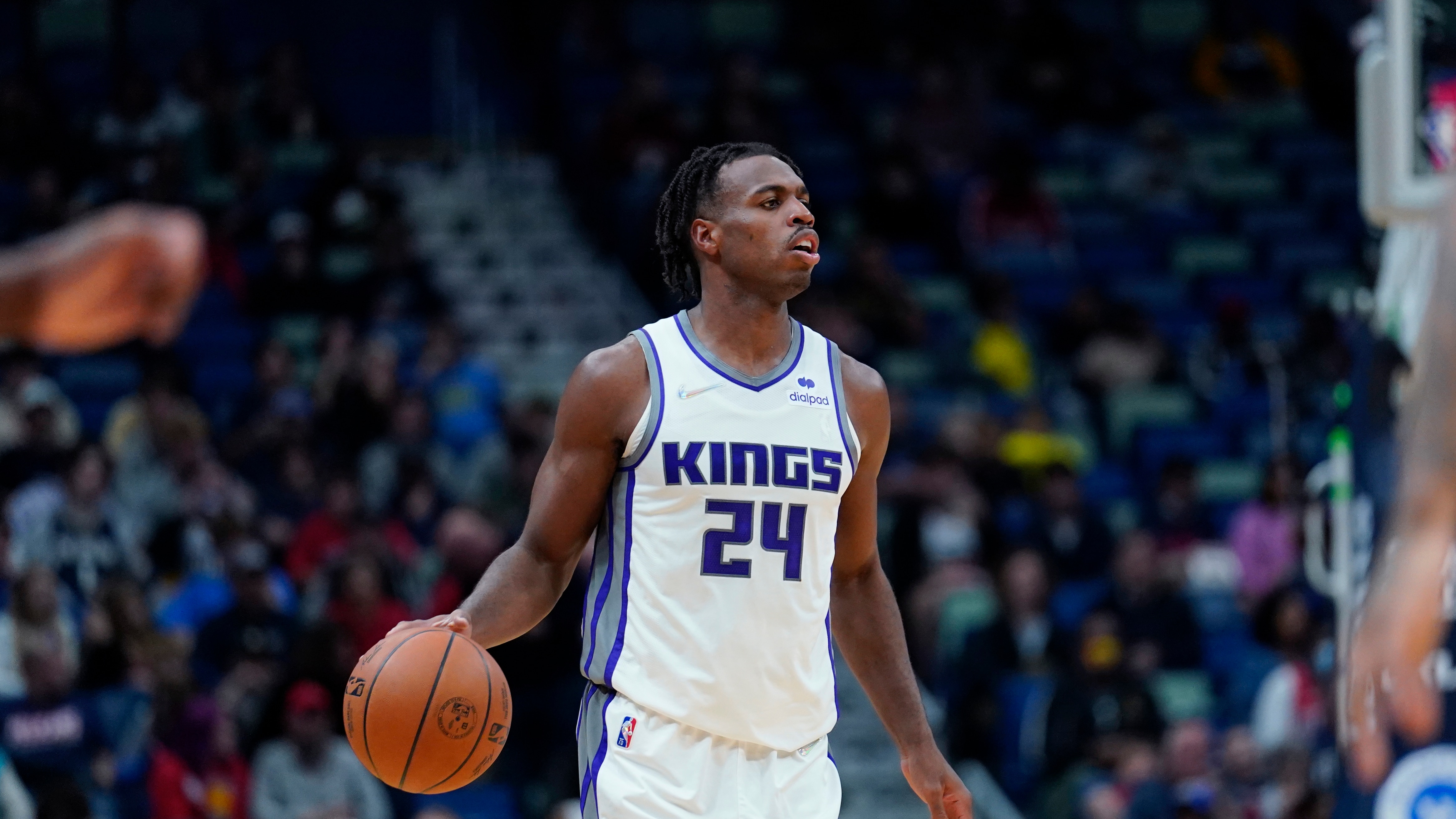 Sacramento Kings guard Buddy Hield (24) moves the ball downcourt in the first half of an NBA basketball game against the New Orleans Pelicans in New Orleans, Friday, Oct. 29, 2021. (AP Photo/Gerald Herbert)