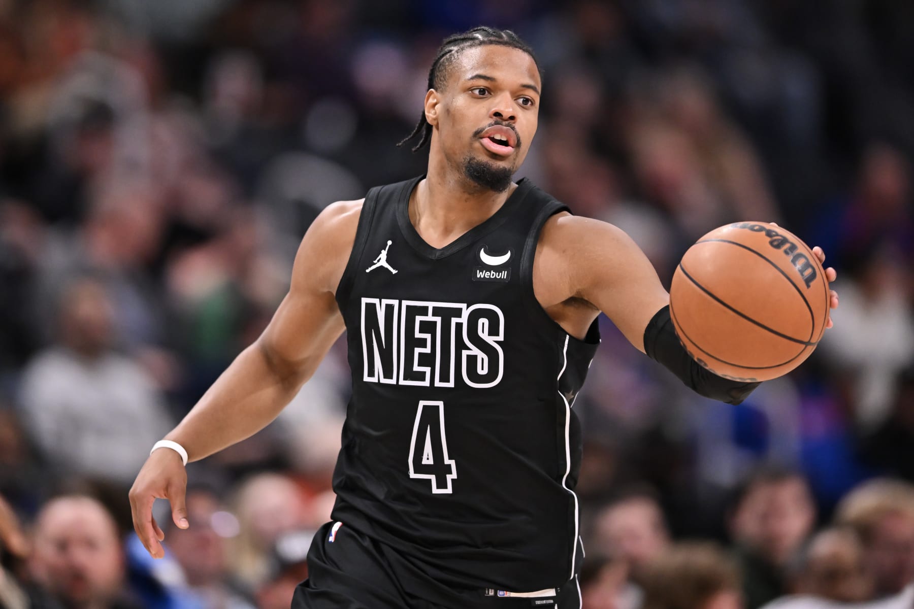 DETROIT, MICHIGAN - MARCH 07: Dennis Smith Jr. #4 of the Brooklyn Nets dribbles the ball against the Detroit Pistons during the second half at Little Caesars Arena on March 07, 2024 in Detroit, Michigan. NOTE TO USER: User expressly acknowledges and agrees that, by downloading and or using this photograph, User is consenting to the terms and conditions of the Getty Images License Agreement. (Photo by Luke Hales/Getty Images)