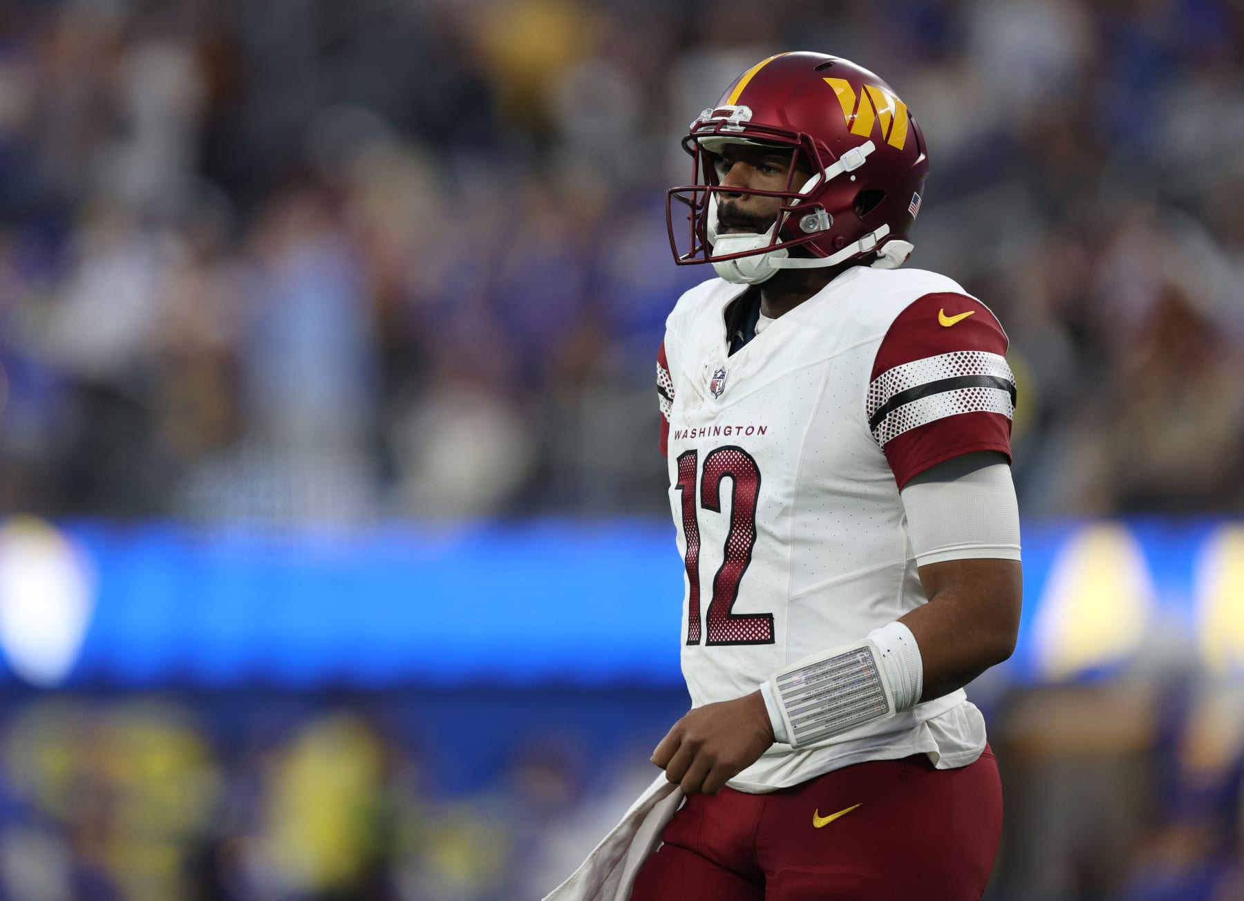 INGLEWOOD, CALIFORNIA - DECEMBER 17: Jacoby Brissett #12 of the Washington Commanders reacts after a Commander penalty during a 28-20 loss to the Los Angeles Rams at SoFi Stadium on December 17, 2023 in Inglewood, California. (Photo by Harry How/Getty Images)