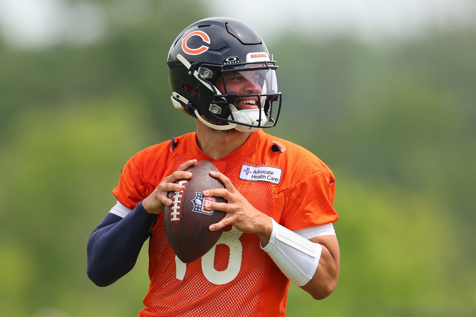 LAKE FOREST, ILLINOIS - JUNE 04: Caleb Williams #18 of the Chicago Bears throws a pass during Chicago Bears Minicamp at Halas Hall on June 04, 2024 in Lake Forest, Illinois. (Photo by Michael Reaves/Getty Images)