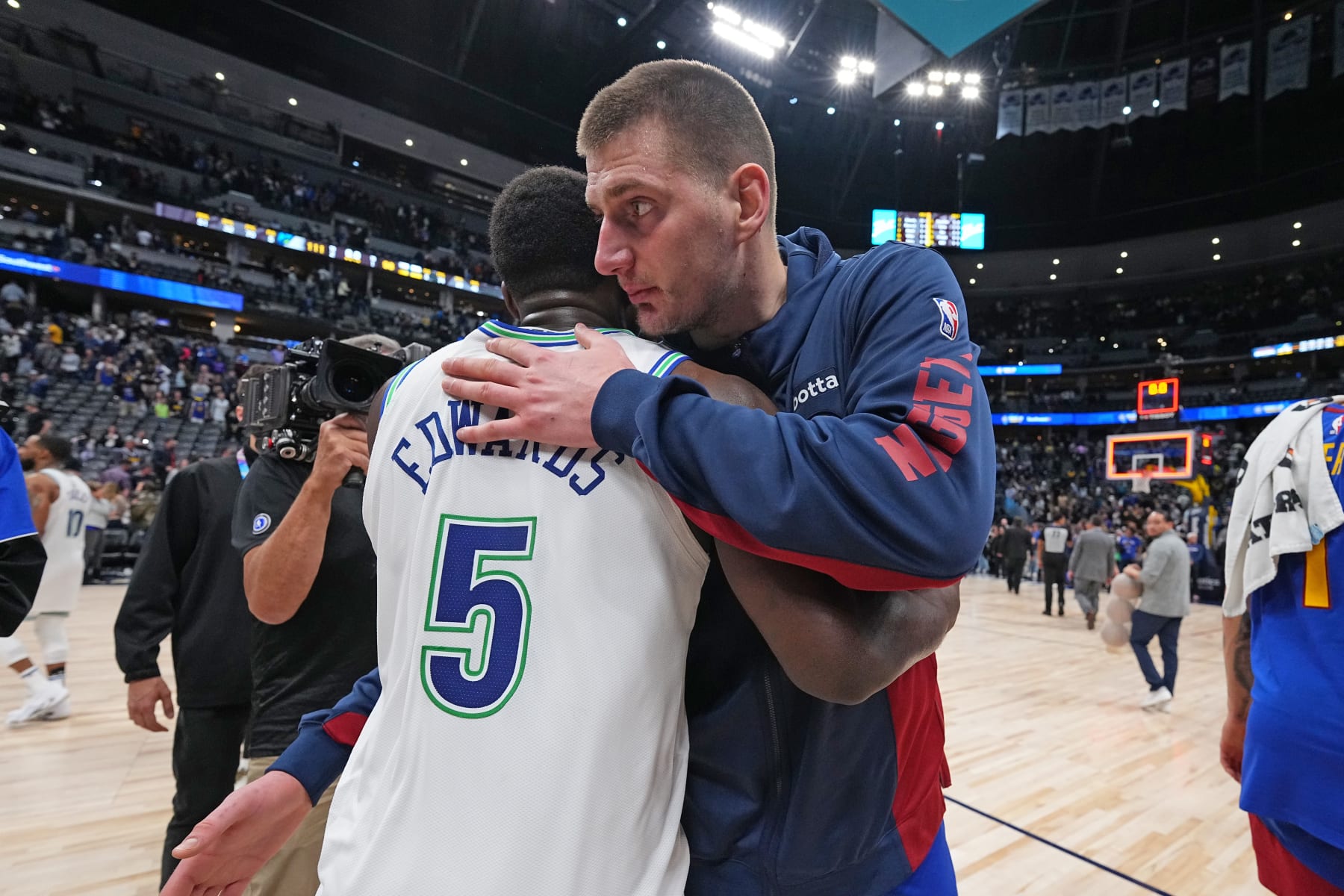 DENVER, CO - MARCH 29: Anthony Edwards #5 of the Minnesota Timberwolves greets Nikola Jokic #15 of the Denver Nuggets after the game on March 29, 2024 at the Ball Arena in Denver, Colorado. NOTE TO USER: User expressly acknowledges and agrees that, by downloading and/or using this Photograph, user is consenting to the terms and conditions of the Getty Images License Agreement. Mandatory Copyright Notice: Copyright 2024 NBAE (Photo by Bart Young/NBAE via Getty Images)