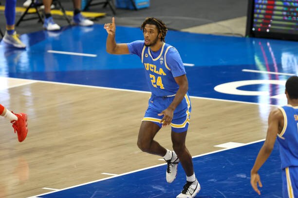 CLEVELAND, OH - DECEMBER 19: UCLA Bruins forward/center Jalen Hill (24) celebrates after scoring with a dunk during the second half of the mens college basketball game between the Ohio State Buckeyes and UCLA Bruins on December 19, 2020, at Rocket Mortgage FieldHouse in Cleveland, OH. Photo by Frank Jansky/Icon Sportswire via Getty Images)