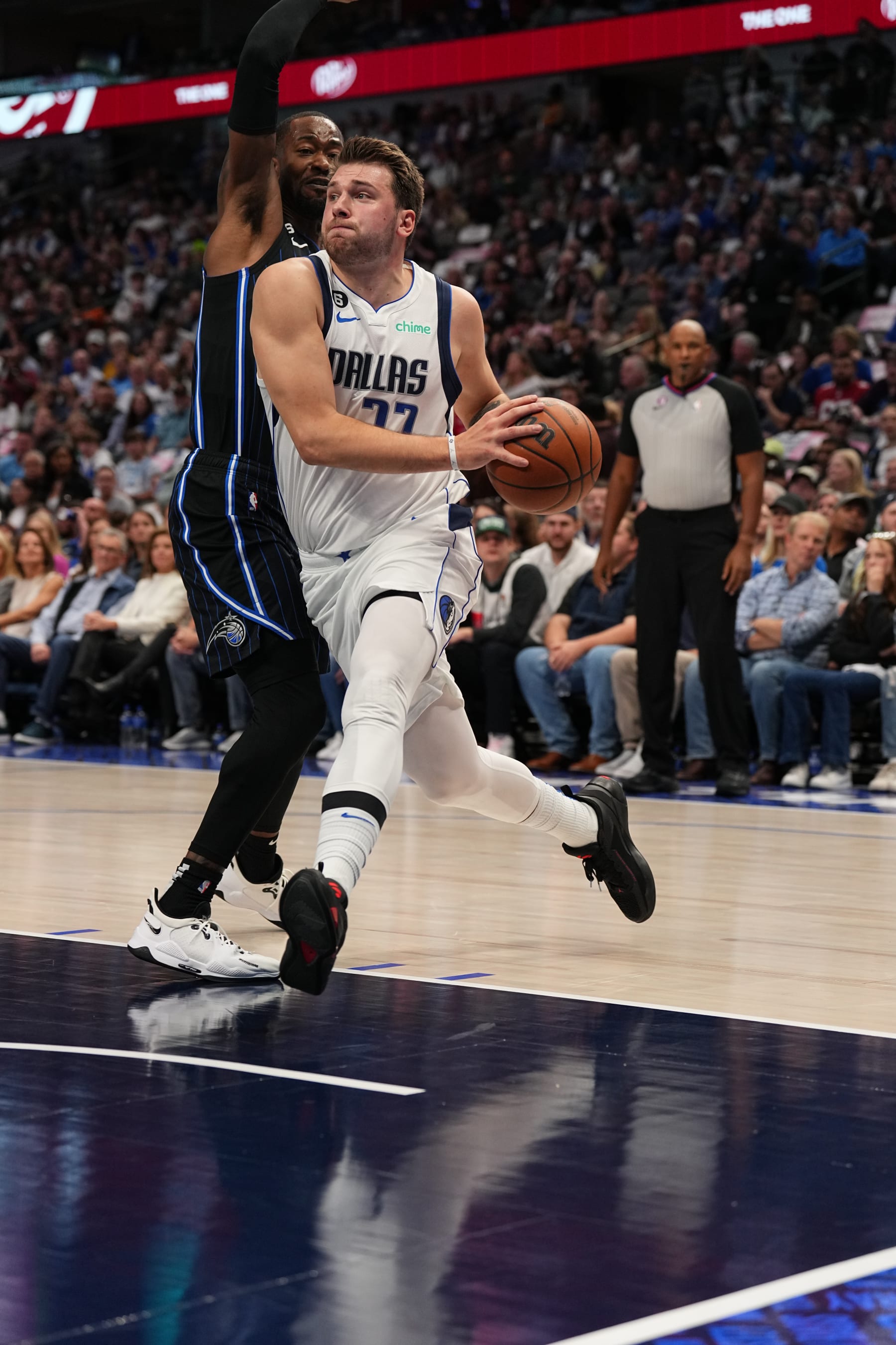 DALLAS, TX - OCTOBER 30: Luka Doncic #77 of the Dallas Mavericks drives to the basket during the game against the Orlando Magic on October 30, 2022 at the American Airlines Center in Dallas, Texas. NOTE TO USER: User expressly acknowledges and agrees that, by downloading and or using this photograph, User is consenting to the terms and conditions of the Getty Images License Agreement. Mandatory Copyright Notice: Copyright 2022 NBAE (Photo by Glenn James/NBAE via Getty Images)