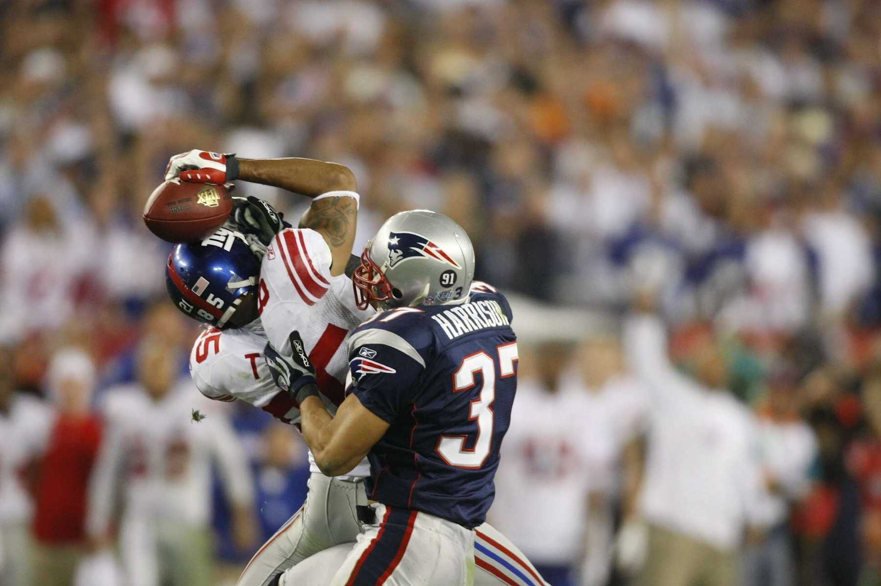 UNITED STATES - FEBRUARY 03:  Football: Super Bowl XLII, New York Giants David Tyree (85) in action, making catch using helmet during 4th quarter vs New England Patriots Rodney Harrison (37), Glendale, AZ 2/3/2008  (Photo by Heinz Kluetmeier/Sports Illustrated via Getty Images)  (SetNumber: X79474 TK2 R4 F168)