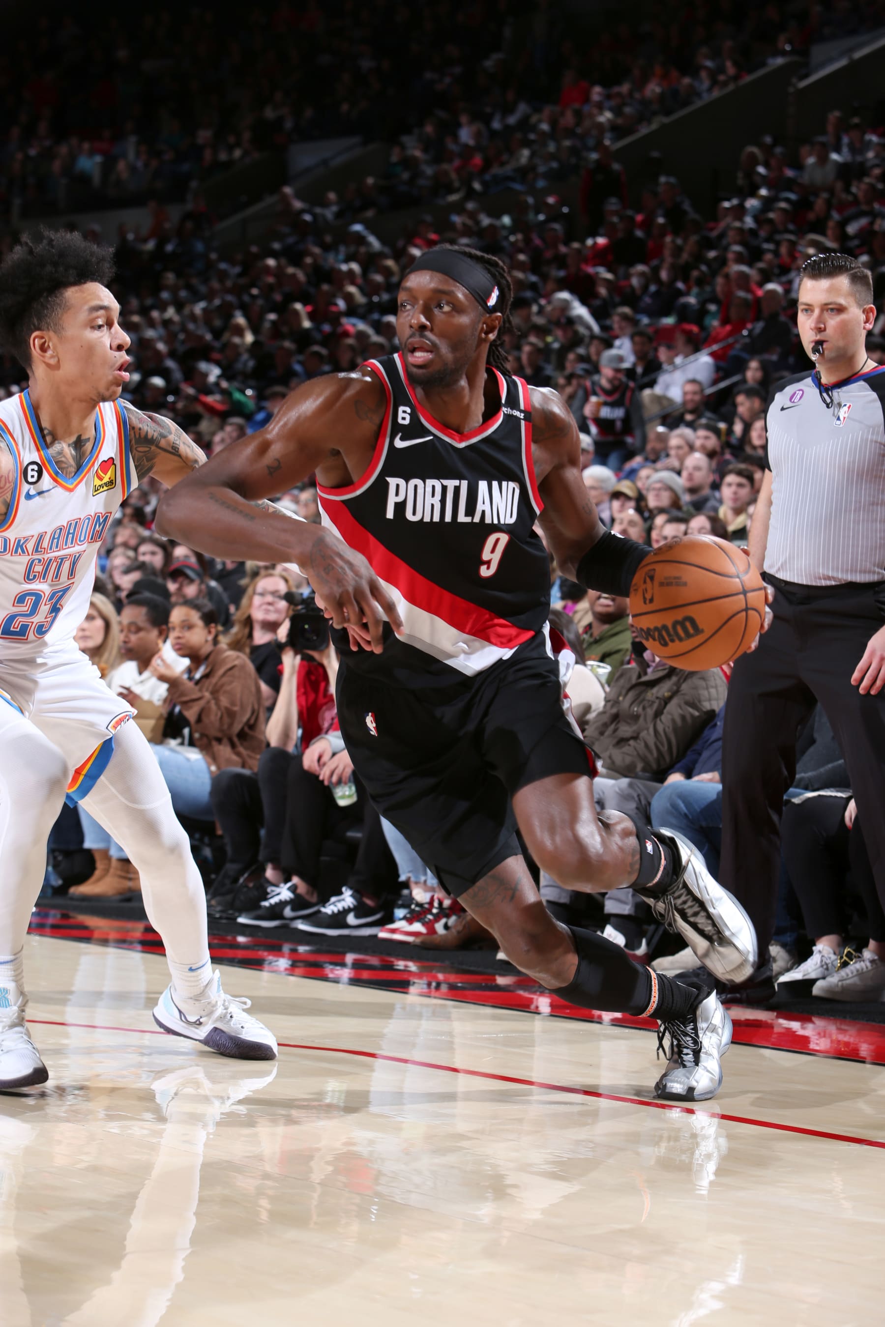 PORTLAND, OR - FEBRUARY 10: Jerami Grant #9 of the Portland Trail Blazers moves the ball during the game against the Oklahoma City Thunder on February 10, 2023 at the Moda Center Arena in Portland, Oregon. NOTE TO USER: User expressly acknowledges and agrees that, by downloading and or using this photograph, user is consenting to the terms and conditions of the Getty Images License Agreement. Mandatory Copyright Notice: Copyright 2023 NBAE (Photo by Sam Forencich/NBAE via Getty Images)