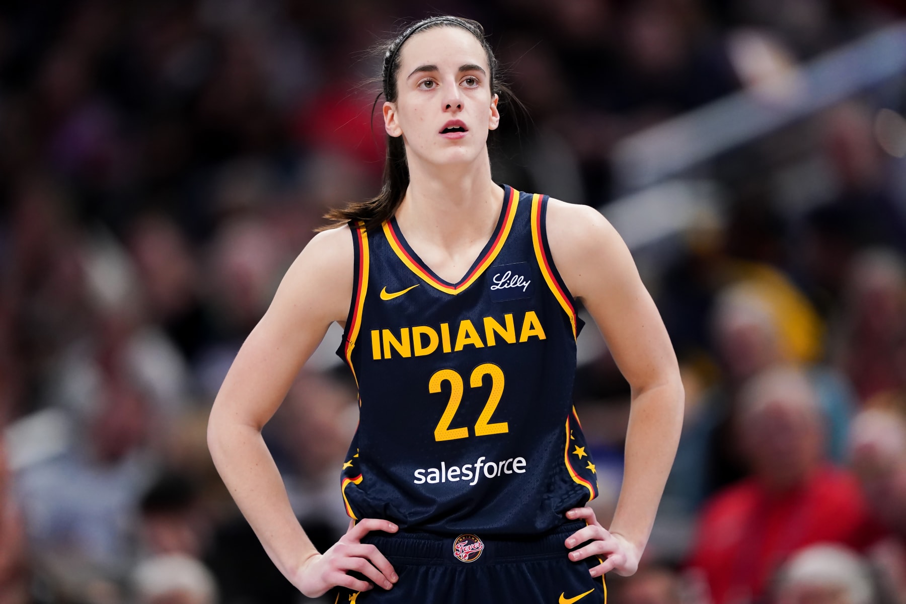 INDIANAPOLIS, INDIANA - MAY 16: Caitlin Clark #22 of the Indiana Fever walks across the court in the second quarter against the New York Liberty at Gainbridge Fieldhouse on May 16, 2024 in Indianapolis, Indiana. NOTE TO USER: User expressly acknowledges and agrees that, by downloading and or using this photograph, User is consenting to the terms and conditions of the Getty Images License Agreement (Photo by Dylan Buell/Getty Images)
