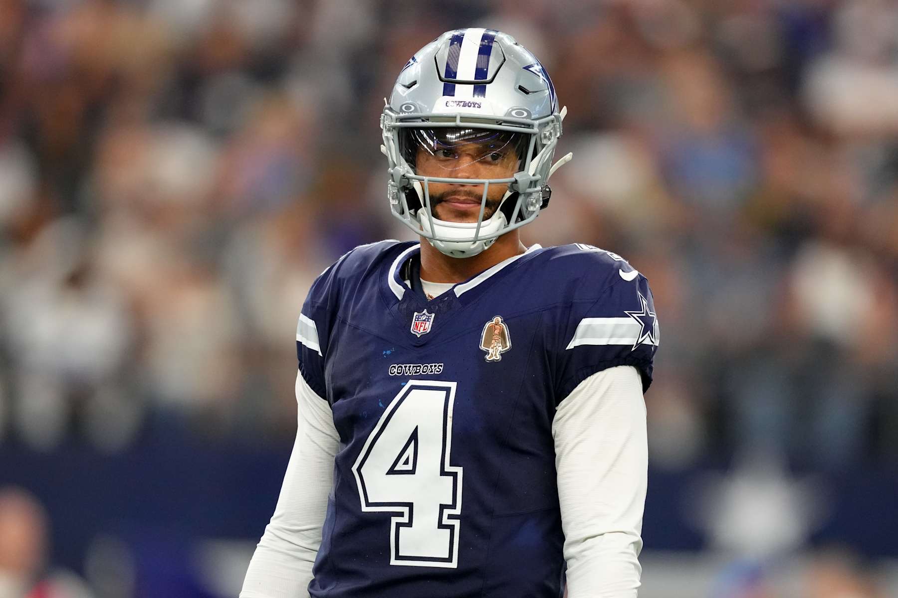 ARLINGTON, TEXAS - OCTOBER 13: Dak Prescott #4 of the Dallas Cowboys looks on during the first half against the Detroit Lions at AT&T Stadium on October 13, 2024 in Arlington, Texas. (Photo by Sam Hodde/Getty Images)