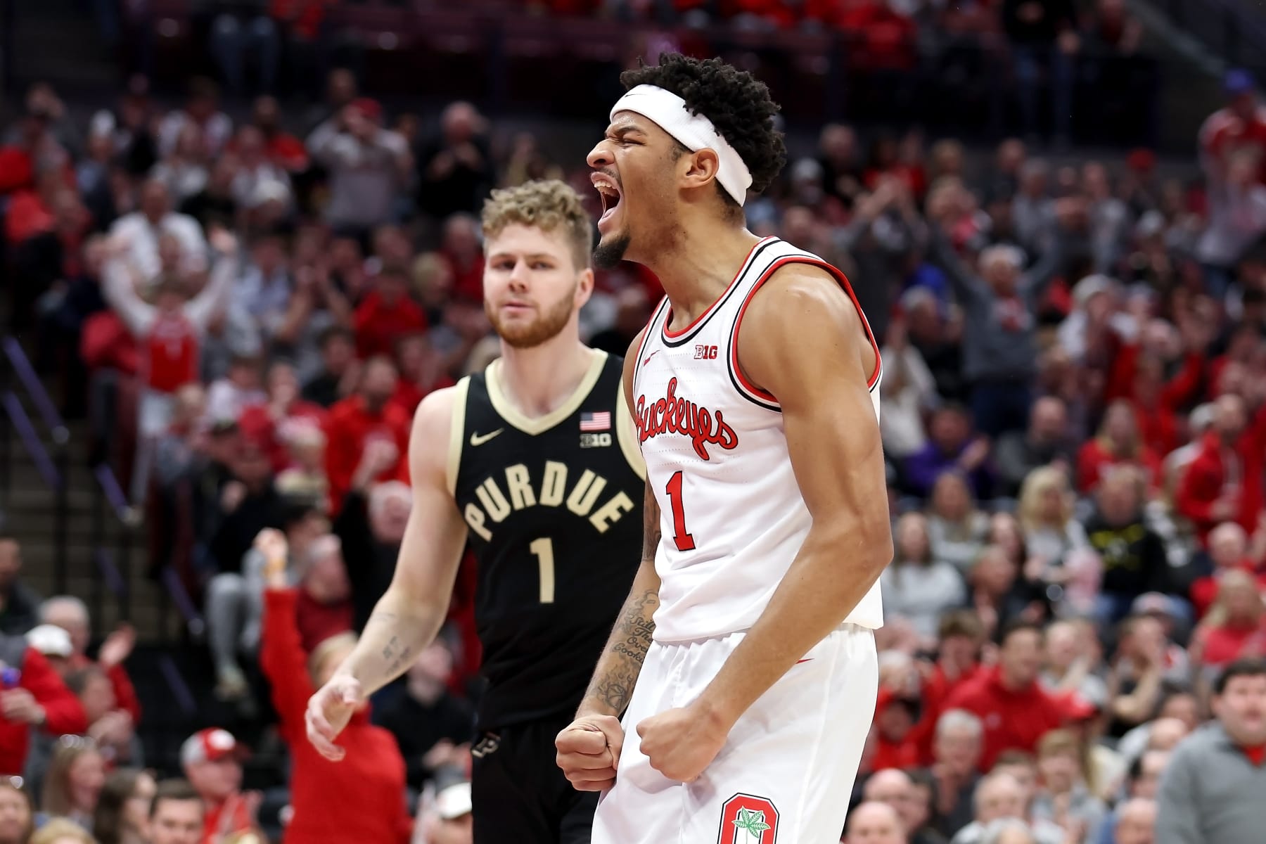 COLUMBUS, OHIO - FEBRUARY 18:  Roddy Gayle Jr. #1 of the Ohio State Buckeyes reacts after dunking the ball during the first half of the game against the Purdue Boilermakers at Value City Arena on February 18, 2024 in Columbus, Ohio. (Photo by Kirk Irwin/Getty Images)