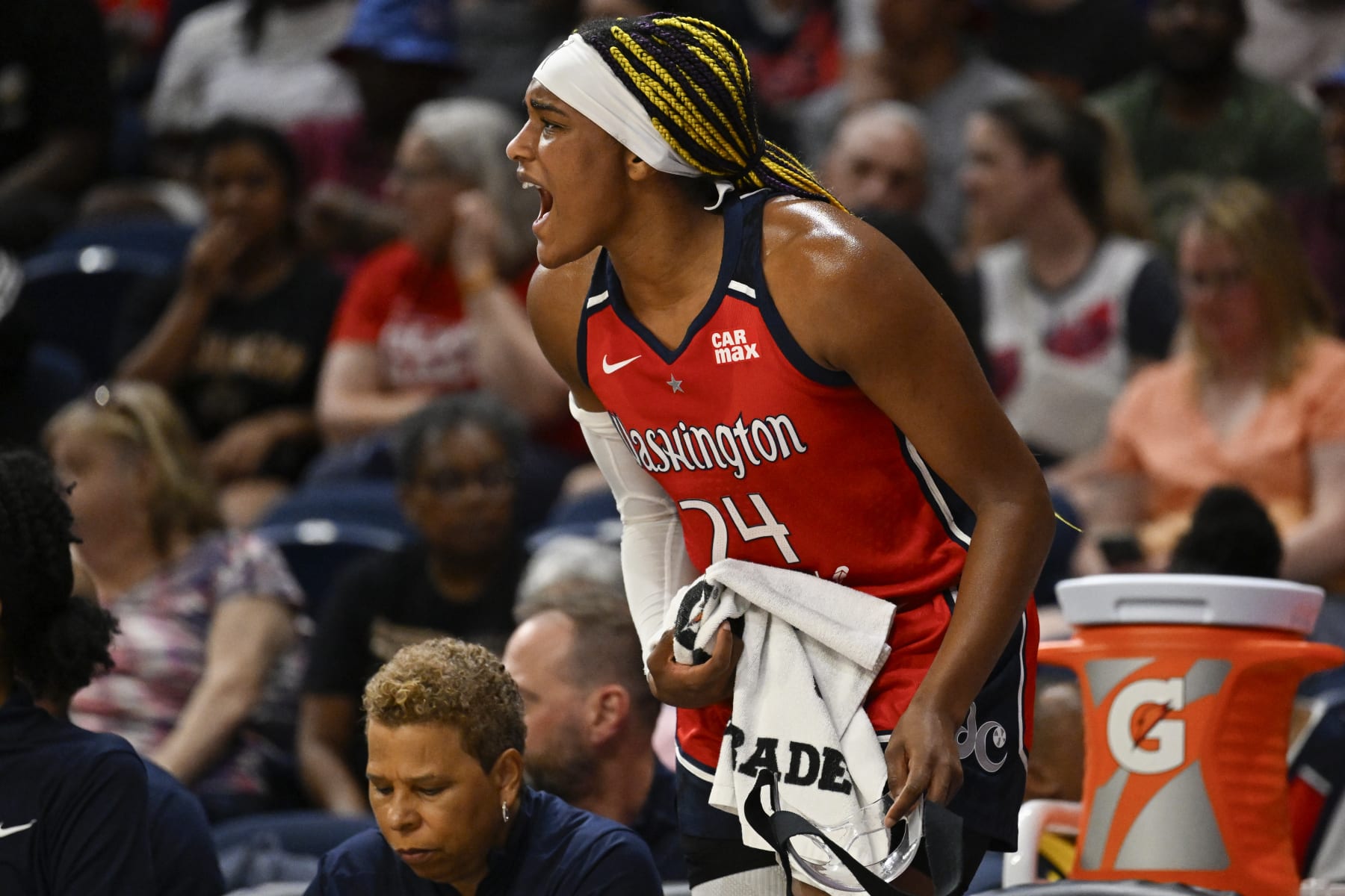 WASHINGTON, DC - JUNE 14 : Washington Mystics forward Aaliyah Edwards (24)yells encouragement from the bench during the Mystics defeat of the Sky in Washington, DC on June 14, 2024. (Photo by John McDonnell/ for The Washington Post via Getty Images)