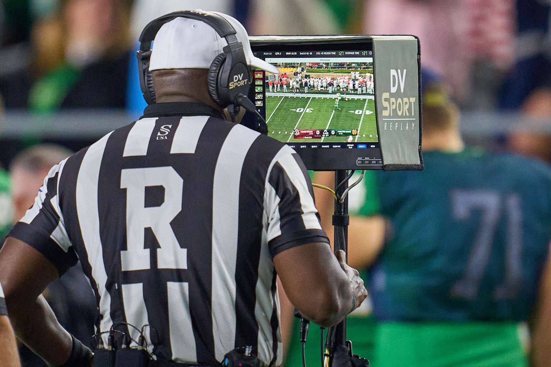 SOUTH BEND, IN - SEPTEMBER 23: A referee looks on the replay screen to evaluate a play in action during a football game between the Notre Dame Fighting Irish and the Ohio State Buckeyes on September 23, 2023 at Notre Dame Stadium in South Bend, IN. (Photo by Robin Alam/Icon Sportswire via Getty Images)