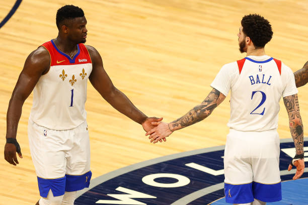 MINNEAPOLIS, MN - MAY 01: Zion Williamson #1 and Lonzo Ball #2 of the New Orleans Pelicans celebrate after a play during over time against the Minnesota Timberwolves at Target Center on May 1, 2021 in Minneapolis, Minnesota. NOTE TO USER: User expressly acknowledges and agrees that, by downloading and or using this photograph, User is consenting to the terms and conditions of the Getty Images License Agreement. (Photo by Harrison Barden/Getty Images)