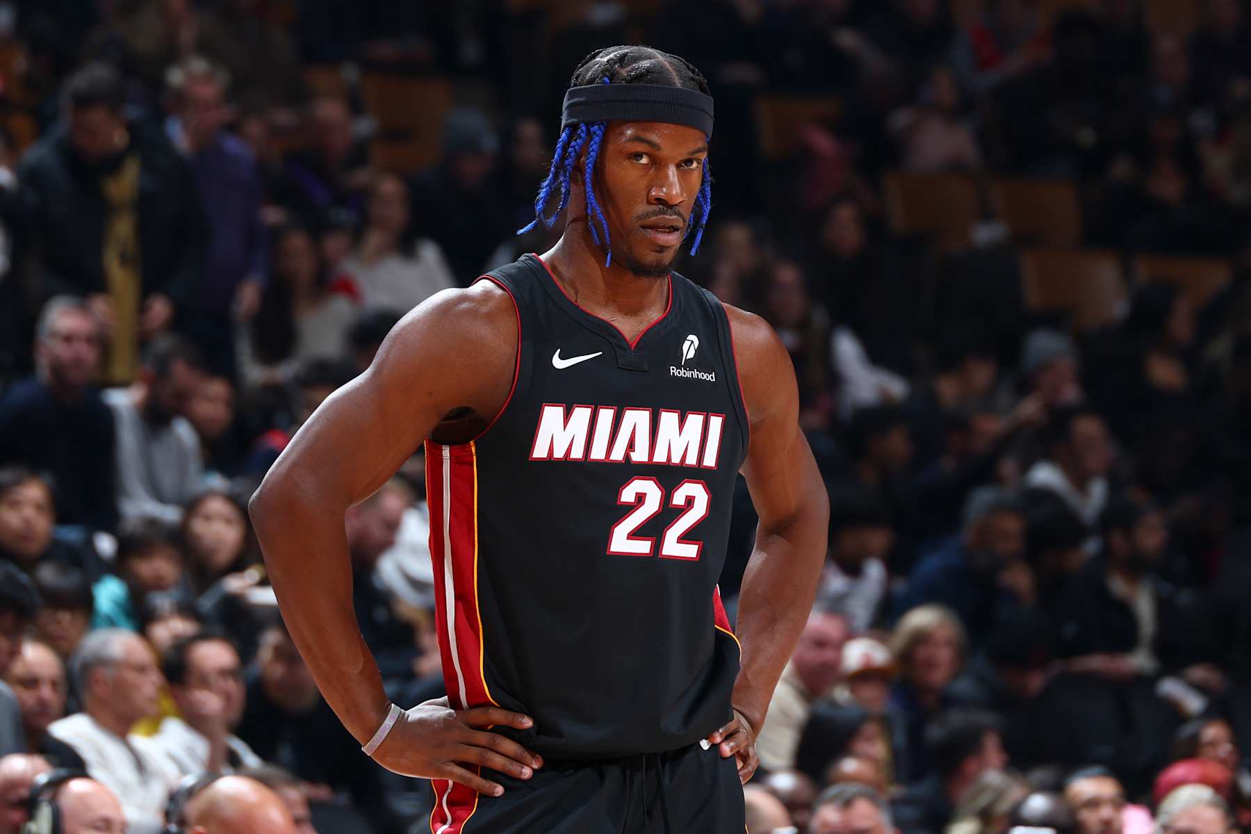 TORONTO, CANADA - DECEMBER 01:  Jimmy Butler #22 of the Miami Heat looks on during the game against the Toronto Raptors on December 1, 2024 at the Scotiabank Arena in Toronto, Ontario, Canada.  NOTE TO USER: User expressly acknowledges and agrees that, by downloading and or using this Photograph, user is consenting to the terms and conditions of the Getty Images License Agreement.  Mandatory Copyright Notice: Copyright 2024 NBAE (Photo by Vaughn Ridley/NBAE via Getty Images)
