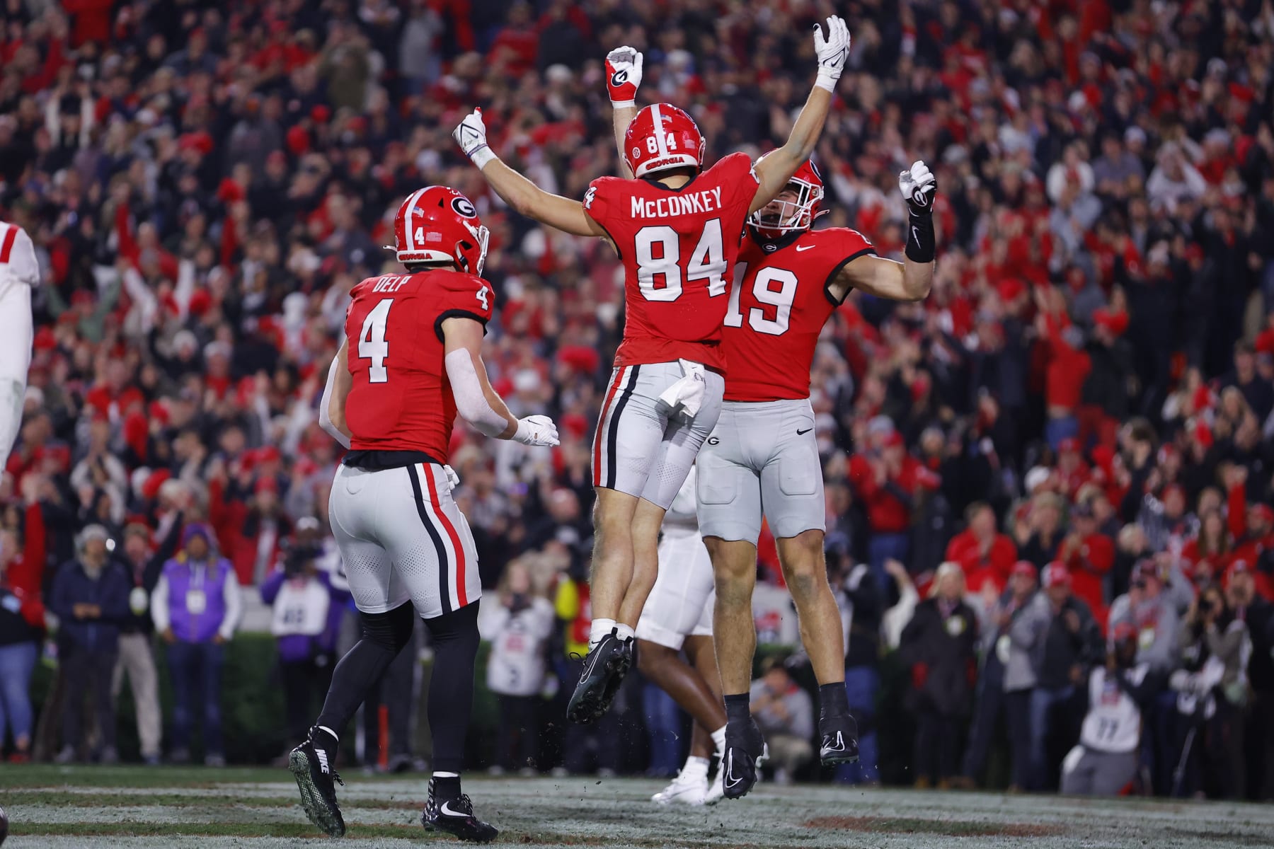 ATHENS, GEORGIA - NOVEMBER 11: Ladd McConkey #84 of the Georgia Bulldogs reacts after a touchdown during the first quarter against the Mississippi Rebels at Sanford Stadium on November 11, 2023 in Athens, Georgia. (Photo by Todd Kirkland/Getty Images)